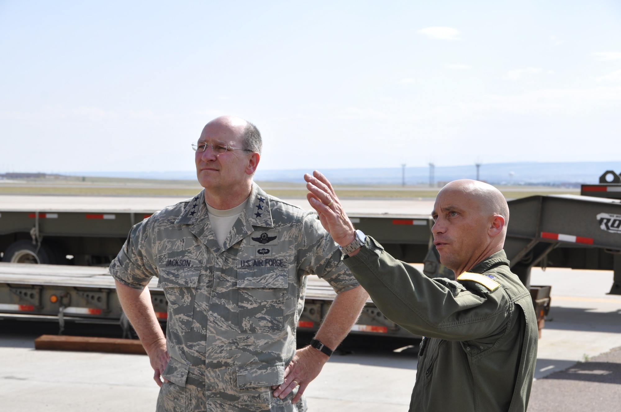 Air Force Reservist Lt. Col. Dave Condit, right, operations officer of the 302nd Airlift Wing’s 731st Airlift Squadron, explains to Lt. Gen. James F. Jackson, chief of Air Force Reserve, and commander, Air Force Reserve Command, how the 302nd AW facilities on the Peterson Air Force Base flightline were designed to also function as a Modular Airborne Fire Fighting System tanker base. Jackson travelled to Colorado Springs to see the Reserve Command’s 302nd Airlift Wing and 310th Space Wing, Schriever AFB, Colo. (U.S. Air Force photo/Tech. Sgt. Daniel Butterfield)