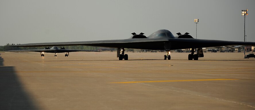 Two B-2 Spirits taxi during a Nuclear Operational Readiness Exercise at Whiteman Air Force Base, Mo., Aug. 29. Eight B-2s were generated simultaneously  in a moment's notice, supporting the Whiteman mission of safely, securely and effectively providing combat ready forces for nuclear deterrence and global strike operations. (U.S. Air Force photo/Senior Airman Cody H. Ramirez)