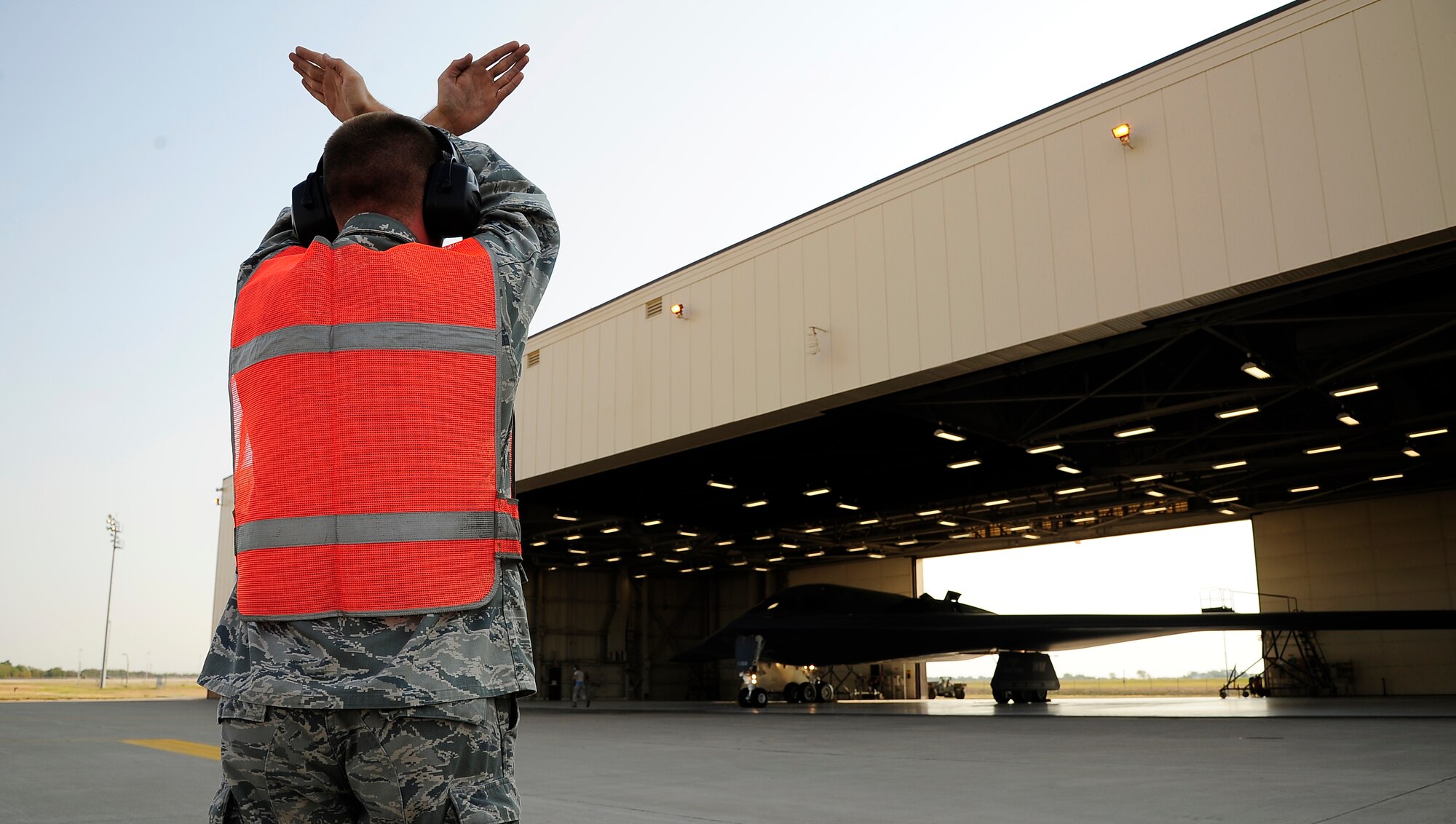 Airman 1st Class Stephan Kuipers, 509th Aircraft Maintenance Squadron B-2 Spirit crew chief, taxis a B-2 during a Nuclear Operational Readiness Exercise at Whiteman Air Force Base, Mo., Aug. 29. The NORE tested the 509th Bomb Wing and its associated units on their readiness in generating aircraft and deploying them when called upon. (U.S. Air Force photo/Senior Airman Cody H. Ramirez)