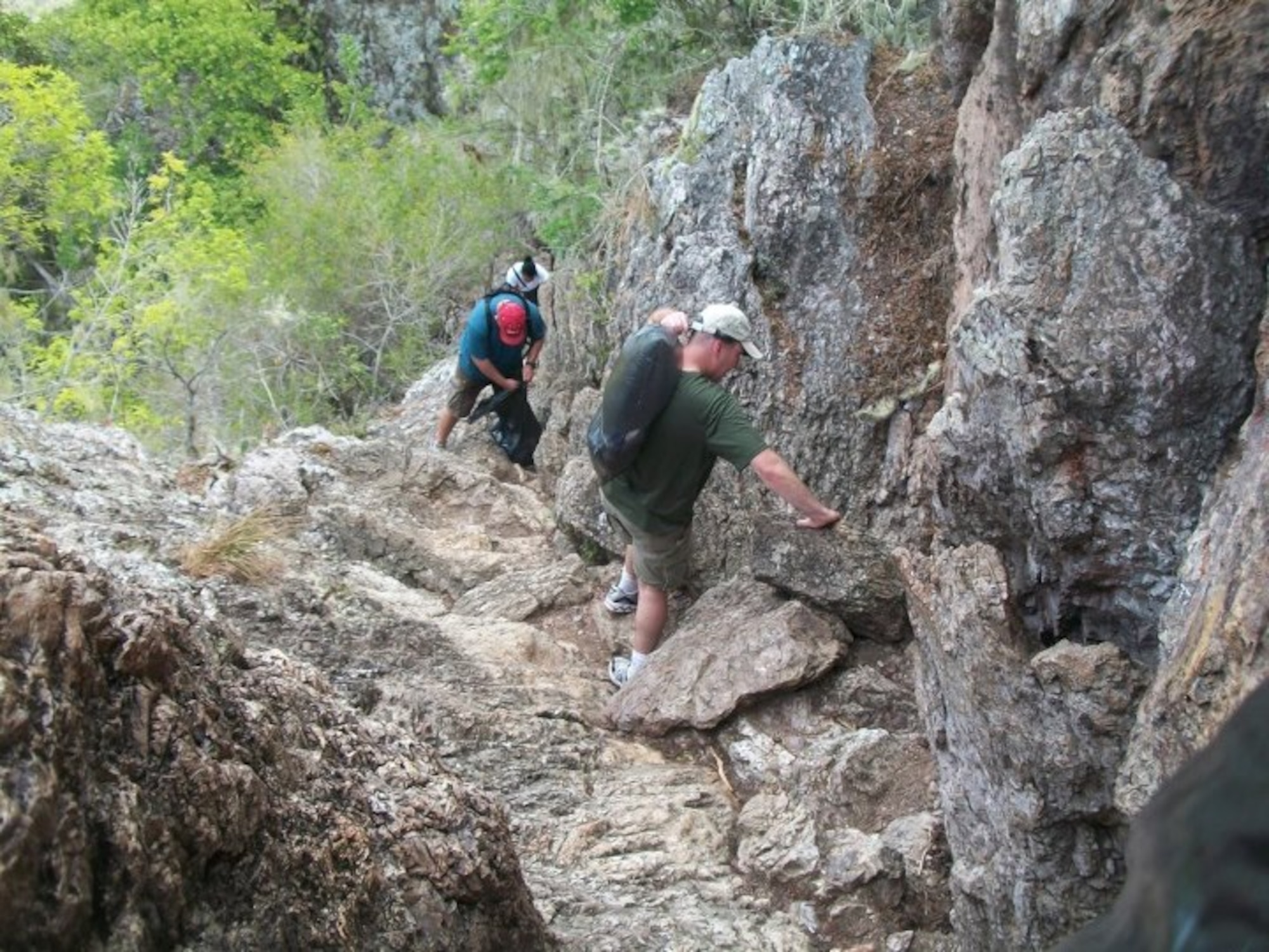 members from U.S. Forward Operations Location Curacao donated their time to help protect Curaçao’s unique natural resources. They scaled the heights of Mt Christoffel and cleared both the peak and trail of trash. This effort benefited both tourists and the local community by enhancing the natural beauty of one of Curaçao’s most visible and visited landmarks . U.S. FOL personnel have long been advocates for the local community, and this was yet another outstanding example of their desire to promote the well-being of both the environment and citizens of Curaçao. (Courtesy photo). 