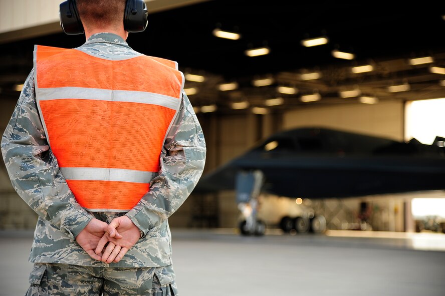 Airman 1st Class Stephan Kuipers, 509th Aircraft Maintenance Squadron B-2 Spirit crew chief, waits to taxi a B-2 Spirit during a Nuclear Operational Readiness Exercise at Whiteman Air Force Base, Mo., Aug. 29. Everyone on base was involved in the base in one way or another; from Brig Gen. Thomas Bussiere, 509th Bomb Wing commander to airmen brand new to the base. The NORE tested the 509th Bomb Wing and its associated units on their readiness in generating aircraft and deploying them when called upon. (U.S. Air Force photo/Senior Airman Cody H. Ramirez)
