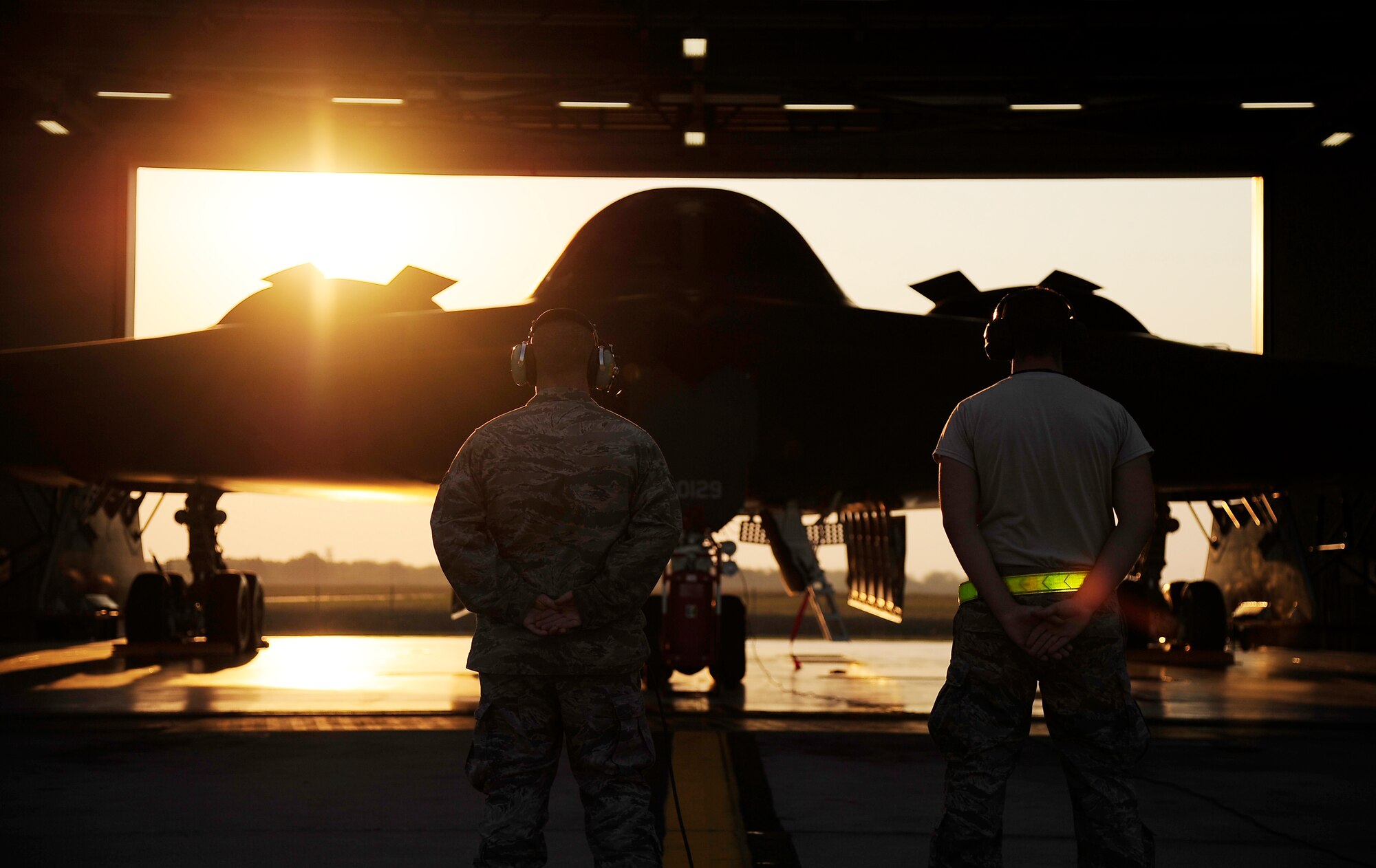 Senior Airman Terence Kopczynski and Airman 1st Class Tyler Gorman, 509th Aircraft Maintenance Squadron B-2 Spirit crew chiefs, conduct pre-flight inspections for a B-2 during a Nuclear Operational Readiness Exercise at Whiteman Air Force Base, Mo., Aug 29. The NORE tested the 509th Bomb Wing and its associated units on their readiness in generating aircraft and deploying them when called upon. (U.S. Air Force photo/Senior Airman Cody H. Ramirez)