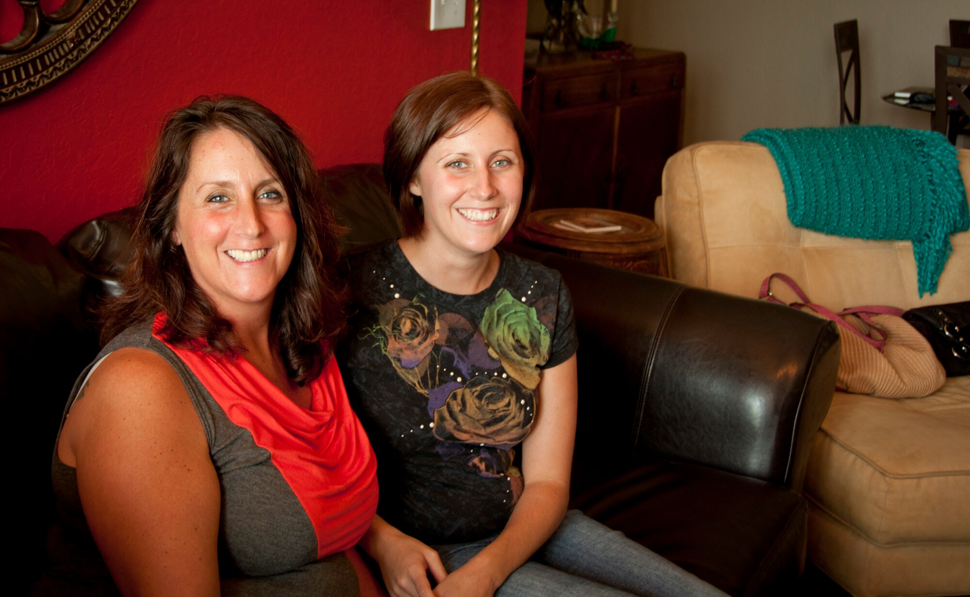 MACDILL AIR FORCE BASE, Fla. -- When Cate Thorp, left, and her daughter, Senior Airman Andrea Lucy, right, discovered Thorp was battling invasive cancer, they saw it as a challenge.  The same spirit that inspires Lucy to serve as a reservist with the 927th Aerospace Medicine Squadron is used to care for her mother so they can beat the disease together.  (Official U.S. Air Force Photo/Staff Sgt. Shawn Rhodes)