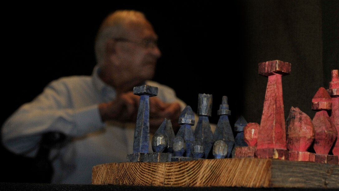 Clovis, N.M., veteran Dan McKinney, talks about his experience as a prisoner of war at Cannon Air Force Base, N.M., Aug. 16, 2012. McKinney served as a POW in the Korean War and has shared his experience with 50 Airman Leadership School classes in order that they might understand the sacrifices made so they can live in peace. (U.S. Air Force photo/Airman 1st Class Ericka Engblom)