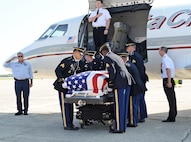 The remains of Sgt. Louis R. Torres were transported through Joint Base San Antonio-Randolph Aug. 29. JBSA-Randolph's Harmon Drive was lined with 
Randolph employees and family members paying final tribute to Torres as his remains were transported back to Ohio. Torres was assigned to the 2nd Battalion, 3rd Infantry Regiment, 3rd Stryker Brigade Combat Team, 2nd Infantry Division at Joint Base Lewis-McChord.  He deployed to Afghanistan with his brigade in December 2011 for his second deployment in support of Operation Enduring Freedom.  He died Aug. 22 from wounds suffered after he encountered an enemy IED Aug. 6 in Kandahar. (U.S. Air Force photo by Benjamin Faske)