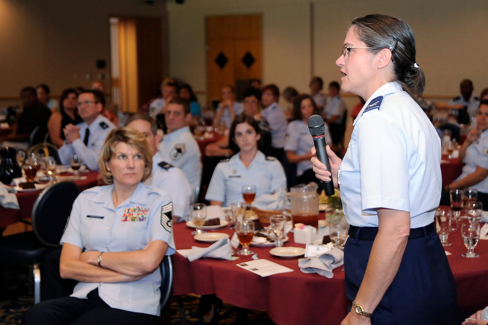 Col. Stella Renner asks RBI Strategies and Research President Rick Ridder about the challenges of collecting demographic data on military voters, many of whom vote in states other than their states of residence, during a Women's Equalidy Day panel at the Air Force Academy Aug. 27, 2012. Also on the panel were Colorado Rep. Crisanta Duran (D-Denver) and Colorado League of Women Voters President Catherine Perrone. Renner is the Academy's vice commandant of culture and climate. (U.S. Air force photo/Mike Kaplan)