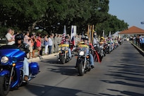 The remains of Sgt. Louis R. Torres were transported through Joint Base San Antonio-Randolph Aug. 29. JBSA-Randolph's Harmon Drive was lined with Randolph employees and family members paying final tribute to Torres as his remains were transported back to Ohio. Torres was assigned to the 2nd Battalion, 3rd Infantry Regiment, 3rd Stryker Brigade Combat Team, 2nd Infantry Division at Joint Base Lewis-McChord.  He deployed to Afghanistan with his brigade in December 2011 for his second deployment in support of Operation Enduring Freedom.  He died Aug. 22 from wounds suffered after he encountered an enemy IED Aug. 6 in Kandahar. (U.S. Air Force photo by Rich McFadden) 