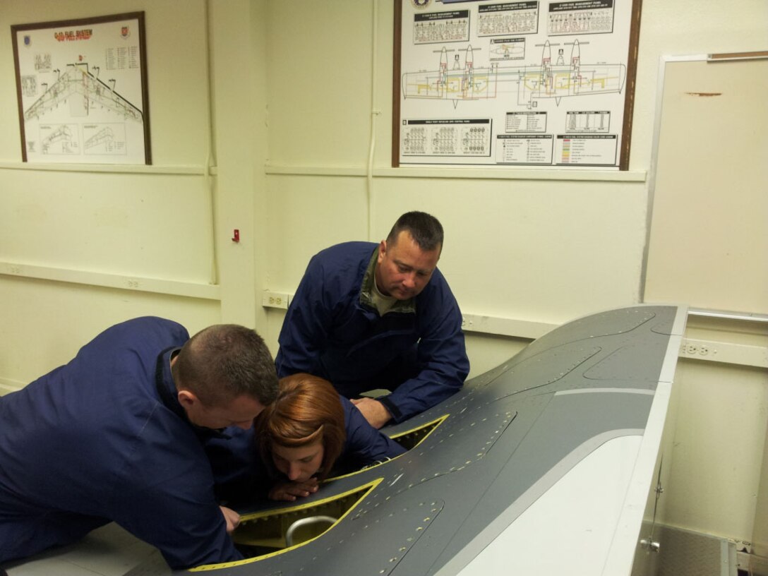 Master Sgt. Larry Freligh (right), participates in a training problem Aug. 29, 2012, during the 361st Training Squadron's fuel systems apprentice course.  Freligh graduated Aug. 30th, 2012, with the ACE award after earning a 100 percent average for the course. (U.S. Air Force courtesy photo)