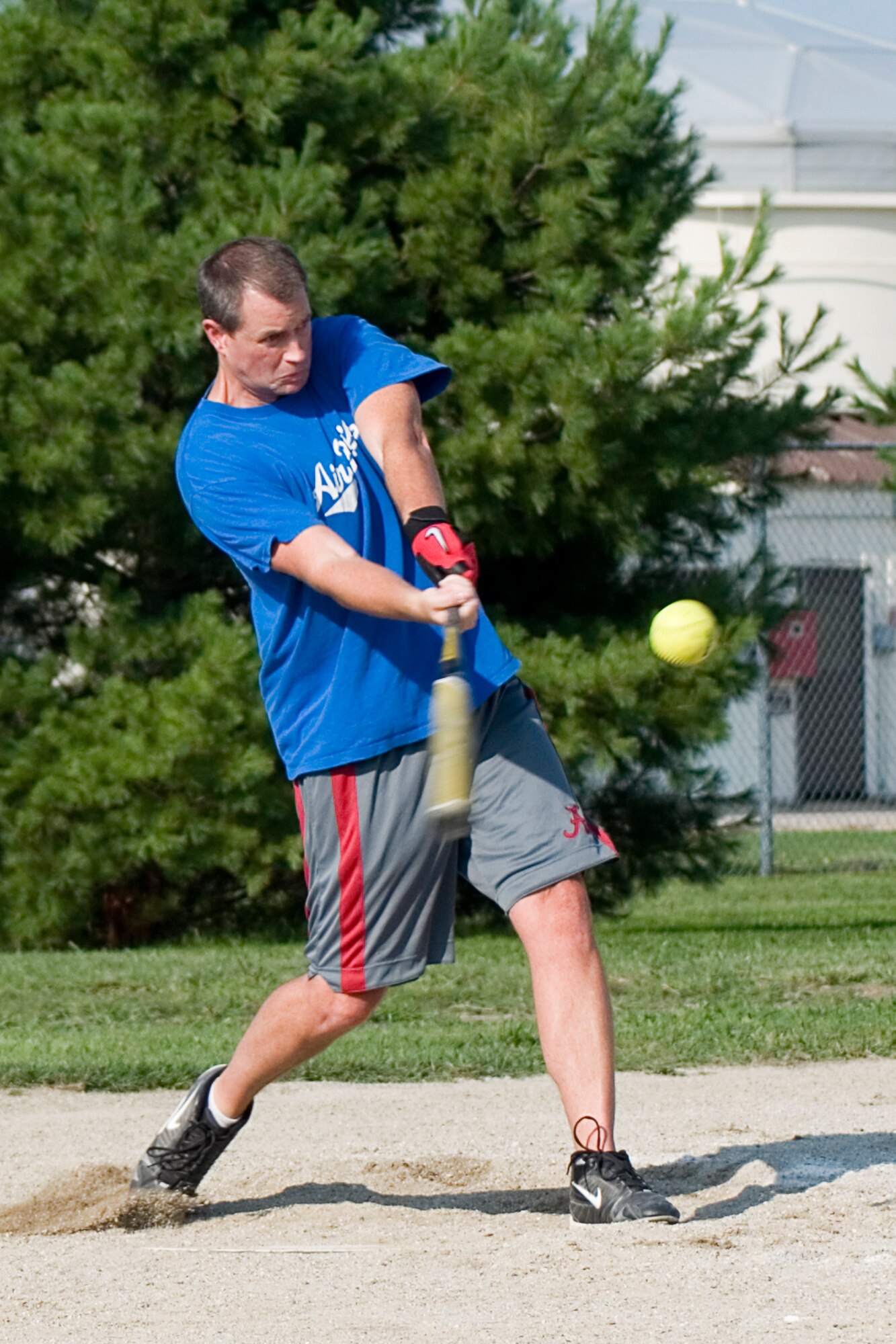 GRISSOM AIR RESERVE BASE, Ind. -- Chad Tice, Grissom Ops, swings at the ball during the intramural softball championship game here Aug. 15. Ops took on the Grissom Fire Dogs and won 16-9. (U.S. Air Force photo by Senior Airman Andrew McLaughlin)
