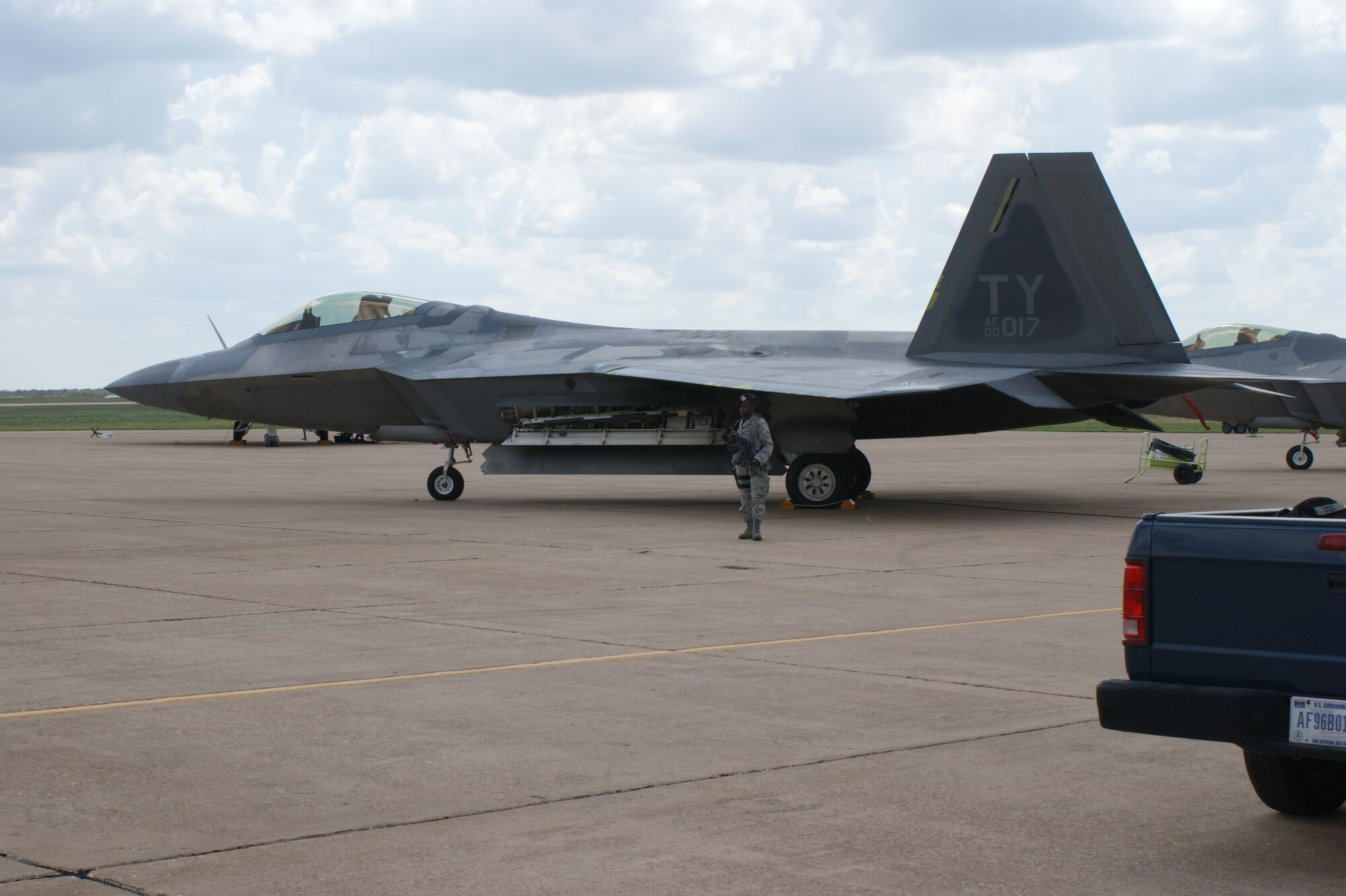 Airman 1st Class Ronieiesha Baker, 82nd Security Forces Squadron, patrols the flightline Aug. 28, 2012 at Sheppard Air Force Base, Texas.  F-22 Raptors from Tyndall Air Force Base, Fla., were evacuated to Sheppard as a precautionary measure in advance of Hurricane Issac.  (U.S. Air Force photo/Josh Wilson)