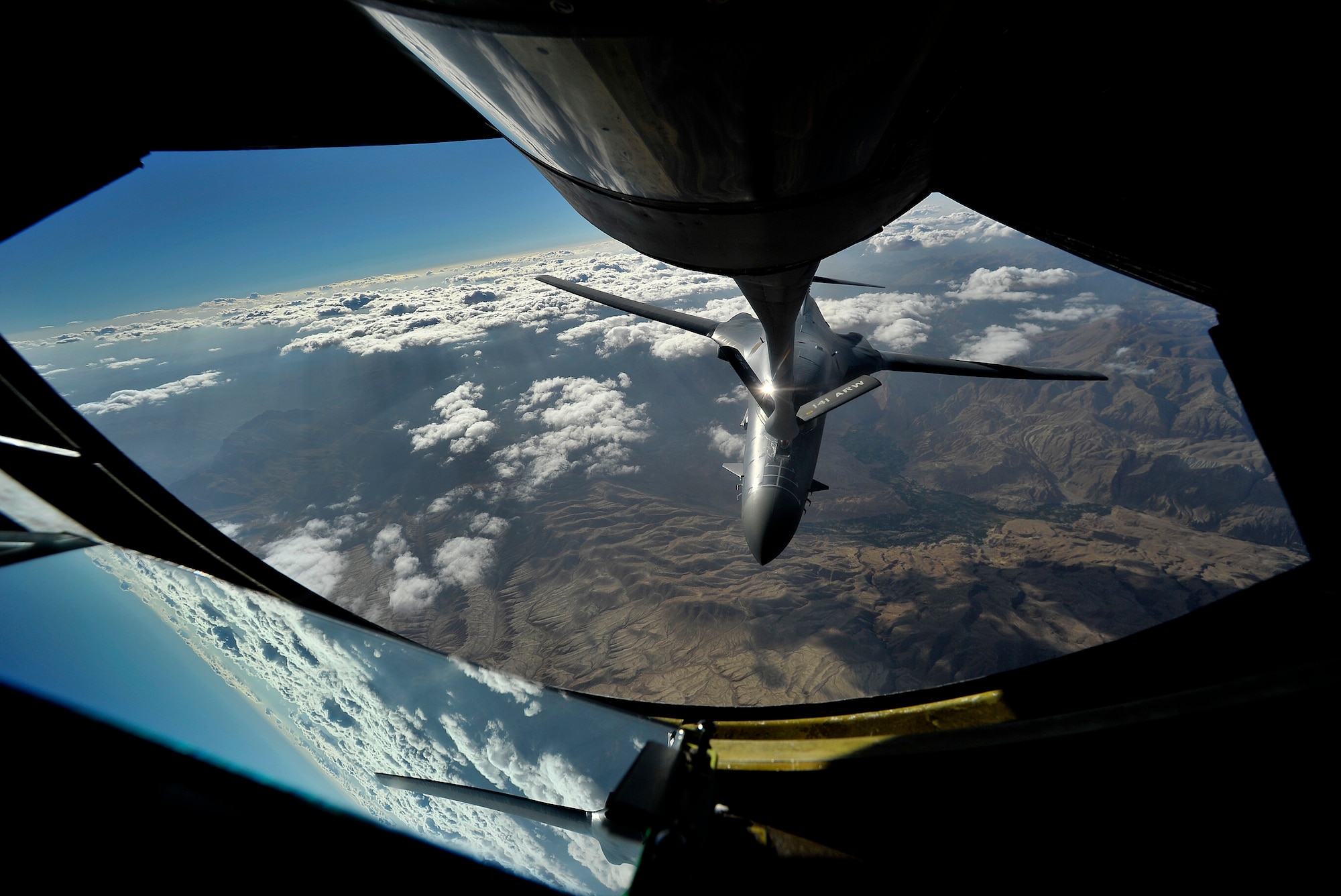 A U.S. Air Force B-1B Lancer is refueled over Afghanistan during overseas contingency operations, August 4, 2012. The 22d Expeditionary Air Refueling Sq. (EARS) conducts missions out of Transit Center at Manas, Kyrgyzstan, and plays an integral role in keeping air assets refueled in support of U.S. and coalition ground forces.  
(U.S. Air Force photo/Staff Sgt. Clay Lancaster/ Released)

