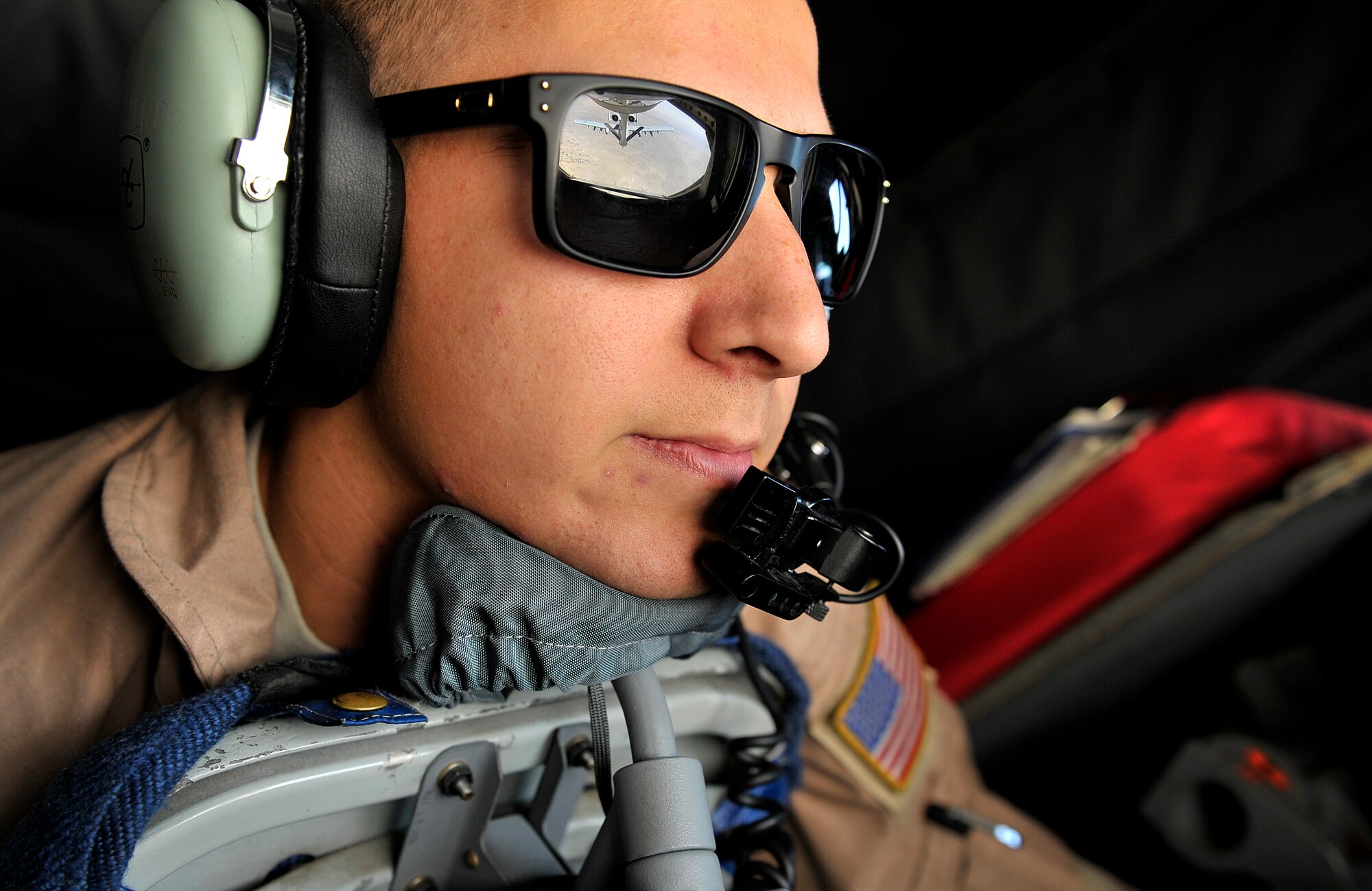 U.S. Air Force Airman 1st Class Frank Pappalardo, KC-135 Stratotanker boom operator, performs and air refueling over Afghanistan, August 3, 2012. A1C Pappalardo is part of the 22d Expeditionary Air Refueling Sq., based out of Transit Center at Manas, Kyrgyzstan.  
(U.S. Air Force photo/Staff Sgt. Clay Lancaster/Released)
