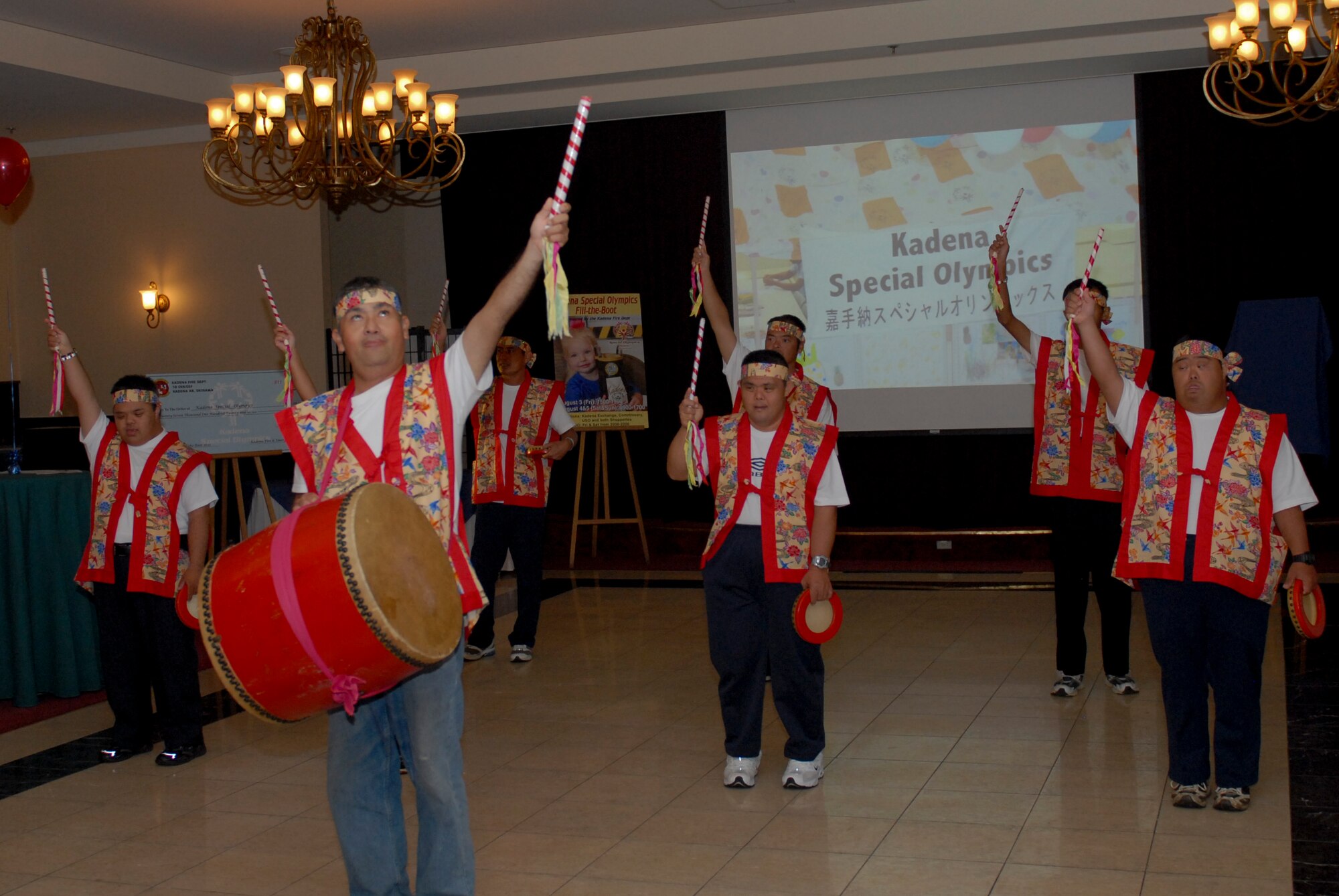 Kuwanomi Taiko Drummers, who are participants in the Kadena Special Olympics, perform at the 2012 KSO Pep Rally held at the Officers Club on Kadena Air Base, Japan, Aug. 28, 2012. The athletes participate in Special Olympics events such as bowling, basketball, floor hockey, flying discs, track and field and golf. (U.S. Air Force photo/Airman 1st Class Hailey R. Davis)