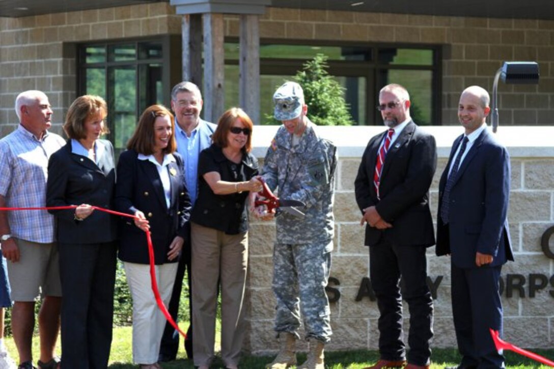 Ms. Jo-Ellen Darcy, Assistant Secretary of the Army for Civil Works, Lt. Col. Chris Becking, U.S. Army Corps of Engineers Philadelphia District commander, and state and local officials celebrate the completion of the two-phase improvement project at Prompton Dam. 