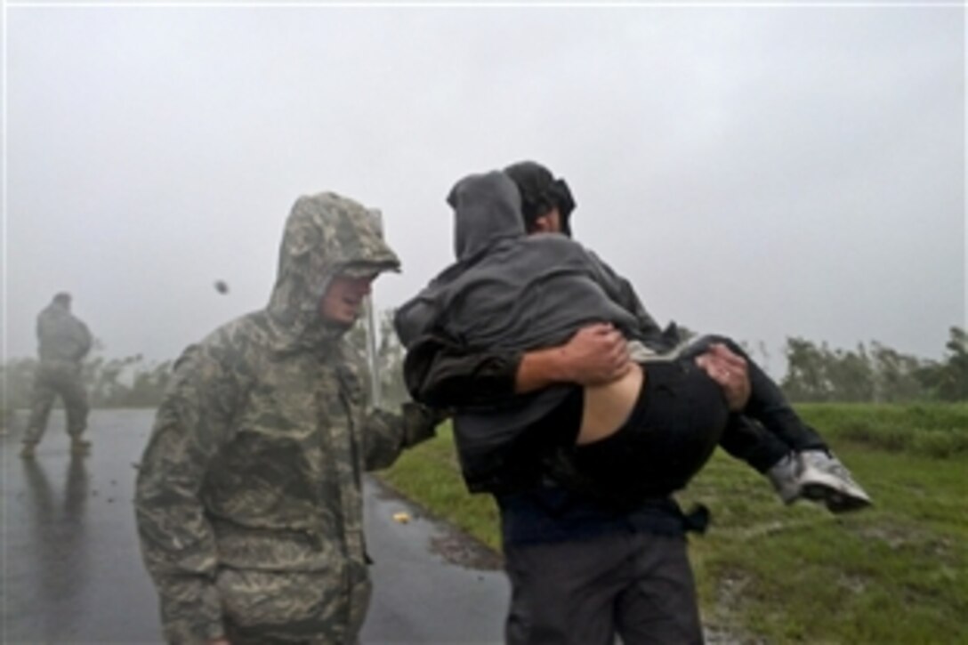 Airmen from the Louisiana National Guard help rescue citizens from Braithwaite, La., in Plaquemines Parish during Hurricane Isaac, Aug. 29, 2012.