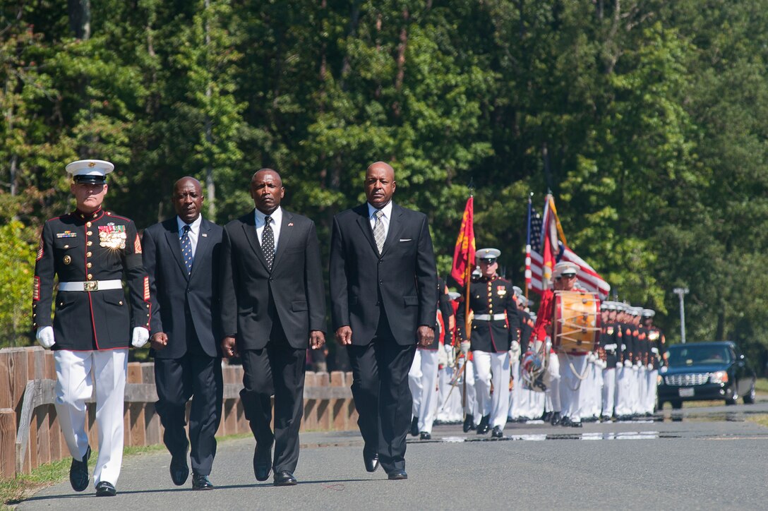 Sgt. Maj. Micheal P. Barrett, sergeant major of the Marine Corps, Carlton Kent, John Estrada and Alford McMichael, the 16th, 15th, and 14th sergeants major of the Marine Corps, and a funeral escort composed of Marine Barracks Washington Marines, march during the procession for the funeral of Henry H. Black, seventh sergeant major of the Marine Corps, at Marine Corps Base Quantico, Va., Aug. 29. Black passed away in his home in Fredericksburg, Va., Aug. 24. He served in Korea and Vietnam and earned a Silver Star, Bronze Star, Purple Heart, and Combat Action Ribbon.
