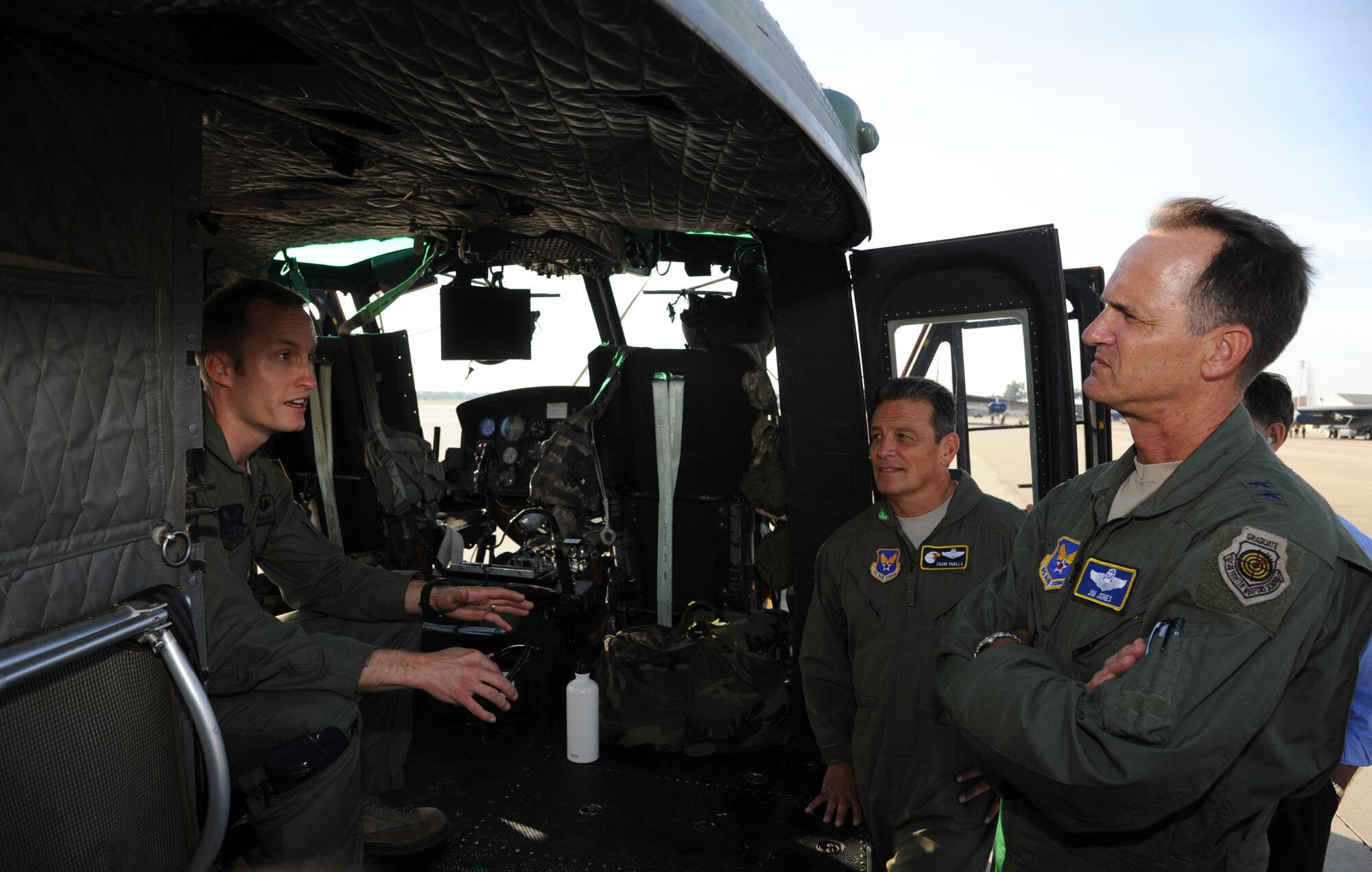 BARKSDALE AIR FORCE BASE, La. -- Capt. Jonathan Sundman, UH-1N helicopter instructor pilot, briefs Air Force Board members during their visit to the base.  The board received briefings and toured Air Force Global Strike Command weapon systems to better understand the command’s mission. (U.S. Air Force photo/Master Sgt. Corey Clements)