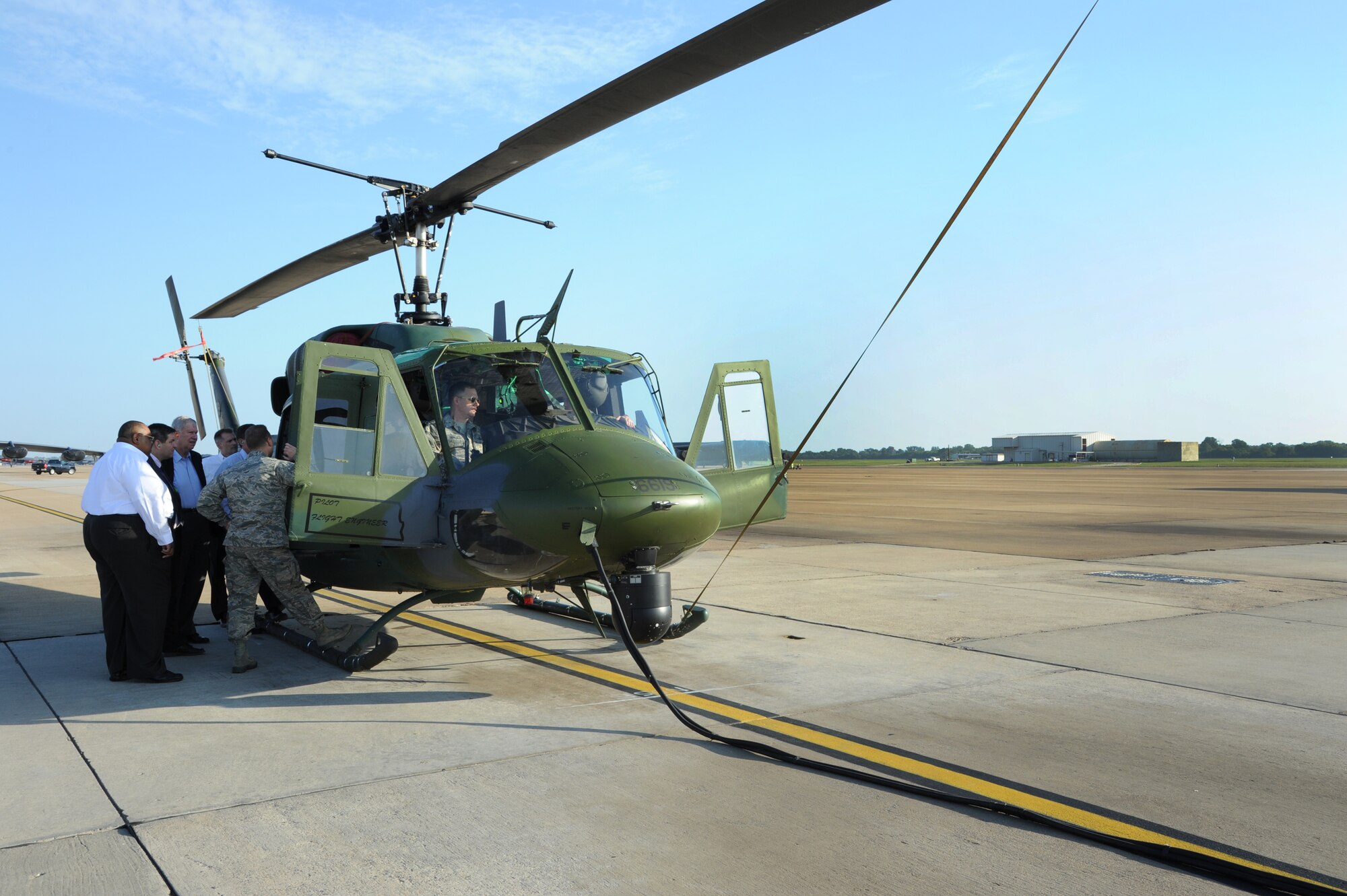 BARKSDALE AIR FORCE BASE, La. -- Air Force Board members explore a UH-1N helicopter during a visit Aug. 28 – 30.  The board received briefings and toured Air Force Global Strike Command weapon systems to better understand the command’s mission. (U.S. Air Force photo/ Airman 1st Class Joseph A. Pagán Jr.)