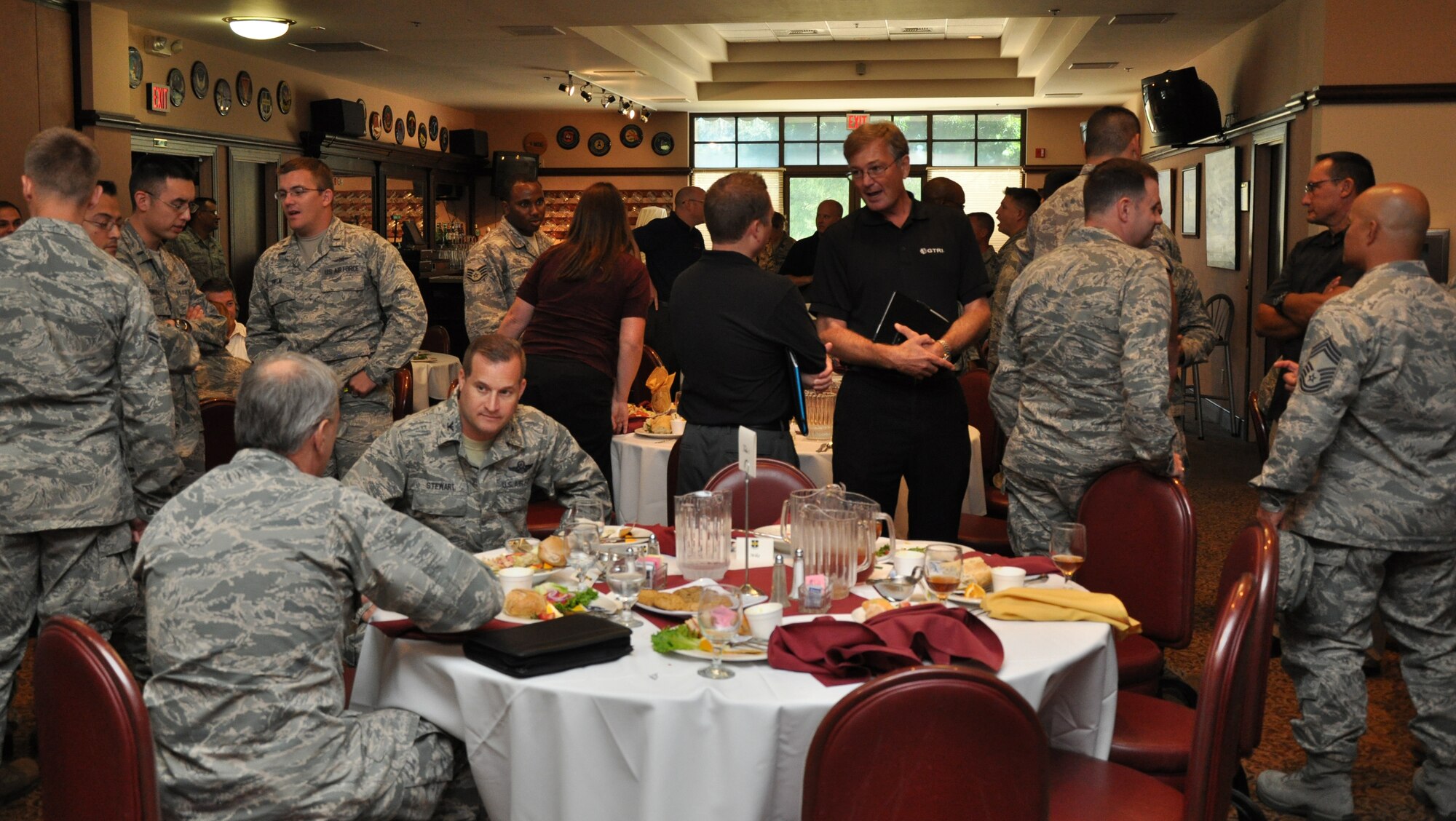 Members of Team Beale network during the inaugural Armed Forces Communication and Electronics Association luncheon at the Recce Point Club Beale Air Force Base, Calif., Aug. 28, 2012. Col. Phil Stewart, 9th Reconnaissance Wing commander was the guest speaker at the event. (U.S. Air Force photo by Staff Sgt. Robert M. Trujillo)