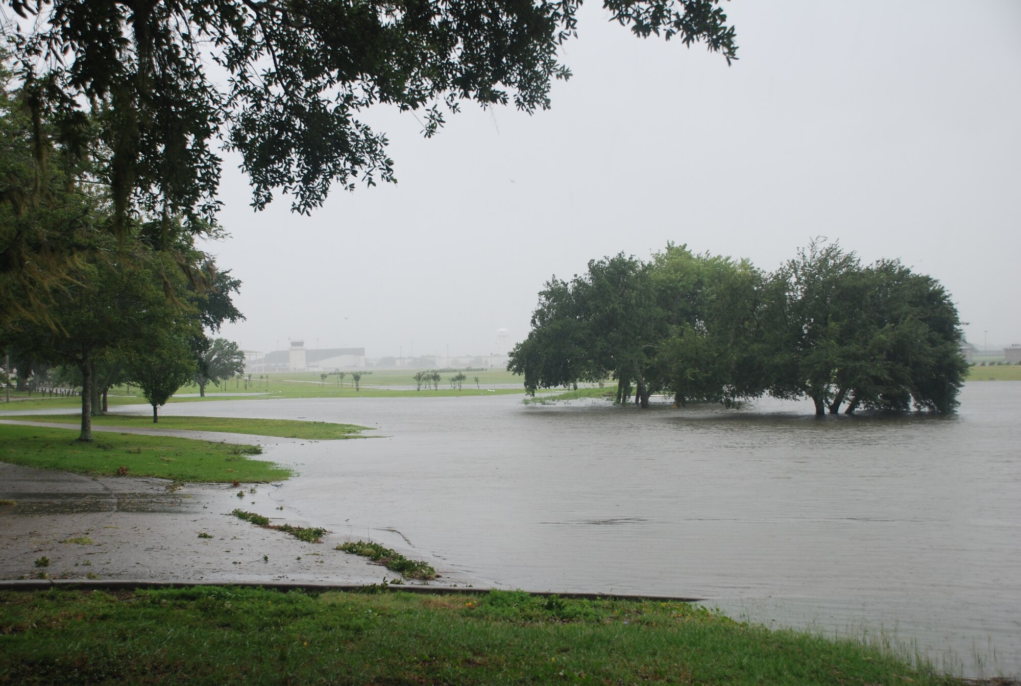 Raised waters from a storm surge in the Back Bay extend from the Marina and cover portions of Keesler’s golf course, Aug. 29, 2012. In an effort to ensure the safety of Keesler personnel and assets during Hurricane Isaac, the base was closed Aug. 28-29 and reopened Aug. 30 following minimal damage.  (U.S. Air Force photo by Staff Sgt. Kimberly Rae Moore)