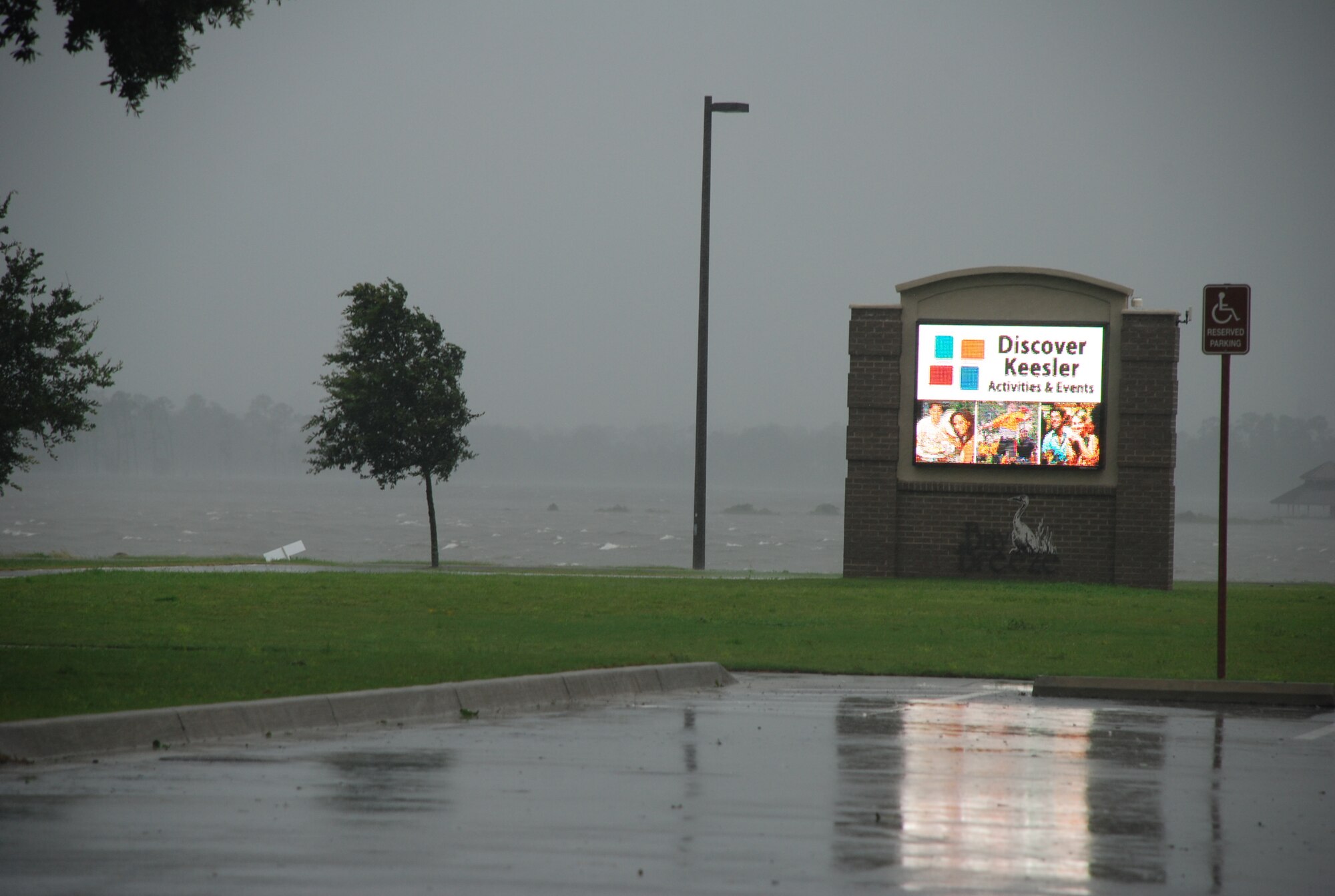 Raised waters from a storm surge in the Back Bay can be visible from Keesler’s Bay Breeze Event Center parking lot, Aug. 29, 2012. In an effort to ensure the safety of Keesler personnel and assets during Hurricane Isaac, the base was closed Aug. 28-29 and reopened Aug. 30 following minimal damage.  (U.S. Air Force photo by Staff Sgt. Kimberly Rae Moore)