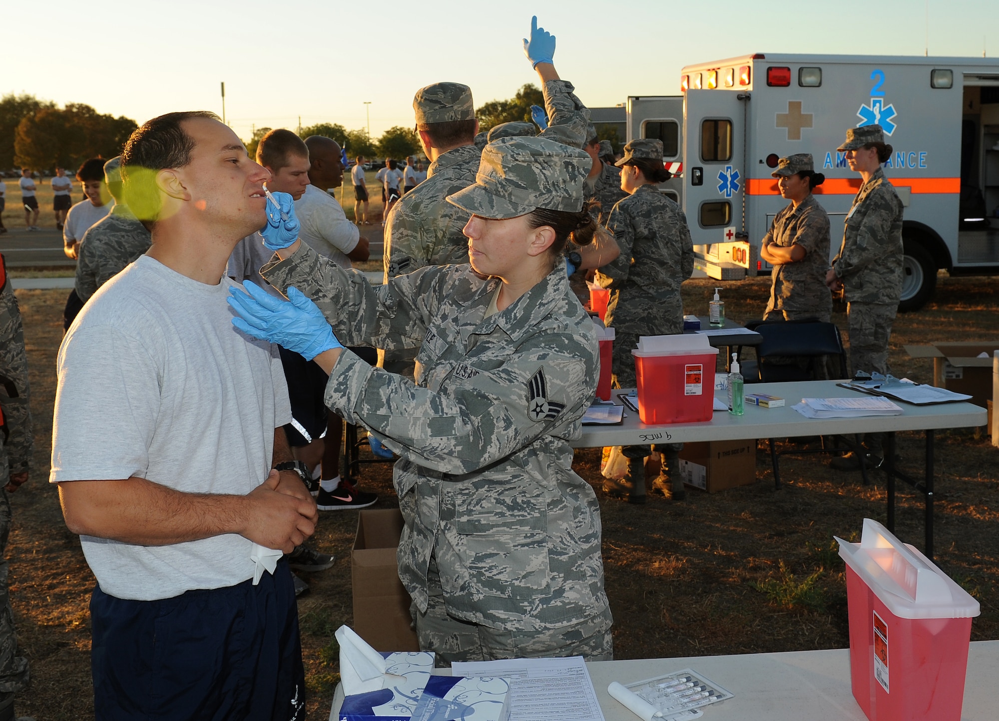 Tech. Sgt. Aaron Oelrich, receives a flu vaccine after the wing run at Beale Air Force Base, Calif., Aug. 30, 2012. Flu vaccines are available at the immunizations office in the clinic. No appointment necessary, call 634-4740 for duty hours and more information. (U.S. Air Force photo by Sean Bhakata)