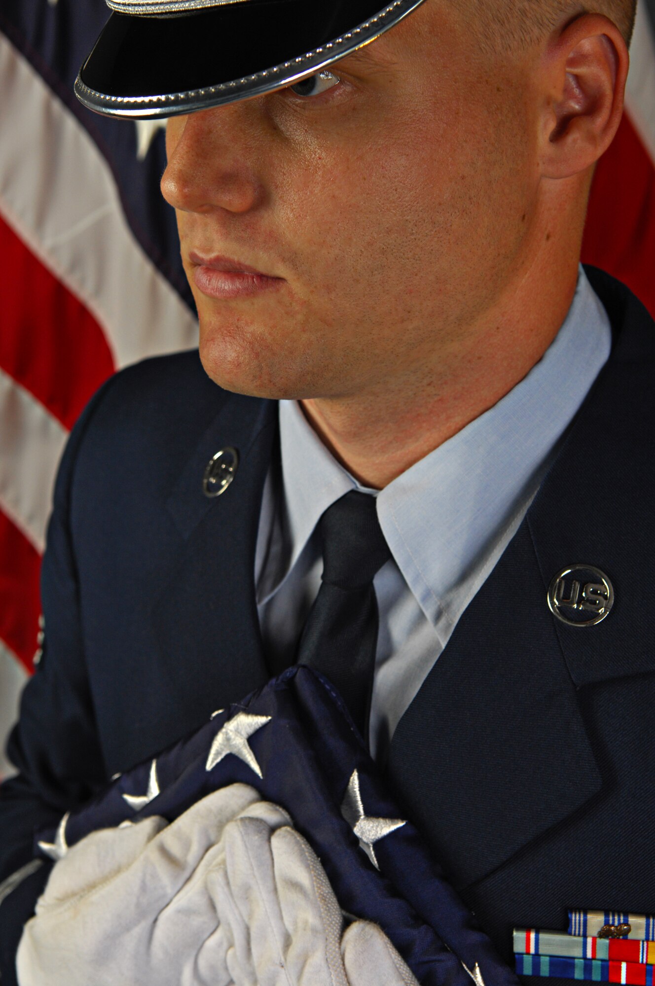 MINOT AIR FORCE BASE, N.D. -- Staff Sgt. Darren Tunnell, 705th Munitions Squadron weapons support shift supervisor, was recently selected for a slot at Air Force-level Honor Guard duty. As an Honor Guard member he will be part of a distinct group of hand-picked Air Force personnel whose full-time job is to serve as ceremonial guardsmen. (U.S. Air Force photo/Senior Airman Desiree Esposito)

