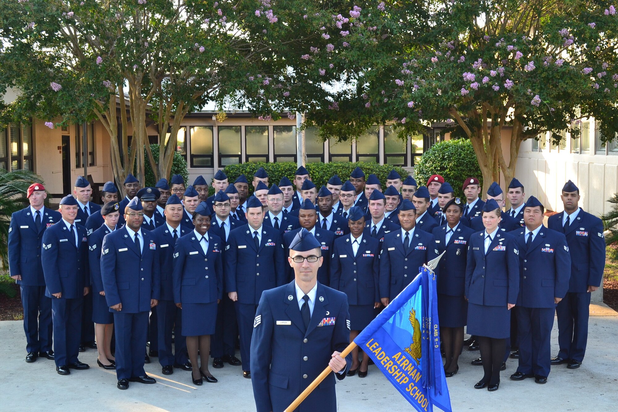 Staff sergeants and senior airmen from Class 12-F of the Vincent Airman Leadership School pose in front of the school at Hurlburt Field, Fla. The class graduated from ALS during a ceremony at the Soundside Club at Hurlburt Field, Fla., Aug. 27, 2012. (Courtesy photo)