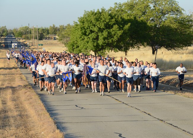Col. Phil Stewart, 9th Reconnaissance Wing commander, and Chief Master Sgt. Robert White, 9th RW command chief, lead more than 900 members of Team Beale in the annual wing run August 30, 2012 at Beale Air Force Base, Calif. All active duty members and civilians from the base were invited to join the run. (U.S. Air Force photo by Mr. John Schwab/ Released)
