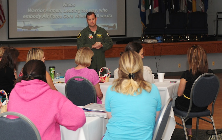 Col. Phil Stewart, 9th Reconnaissance Wing commander, speaks with members of Beale's key spouse program at the Community Activity Center Beale Air Force Base, Calif., August 29, 2012. Key spouses are volunteers who are selected and work for their squadron commander. (U.S. Air Force photo by Senior Airman Allen Pollard)