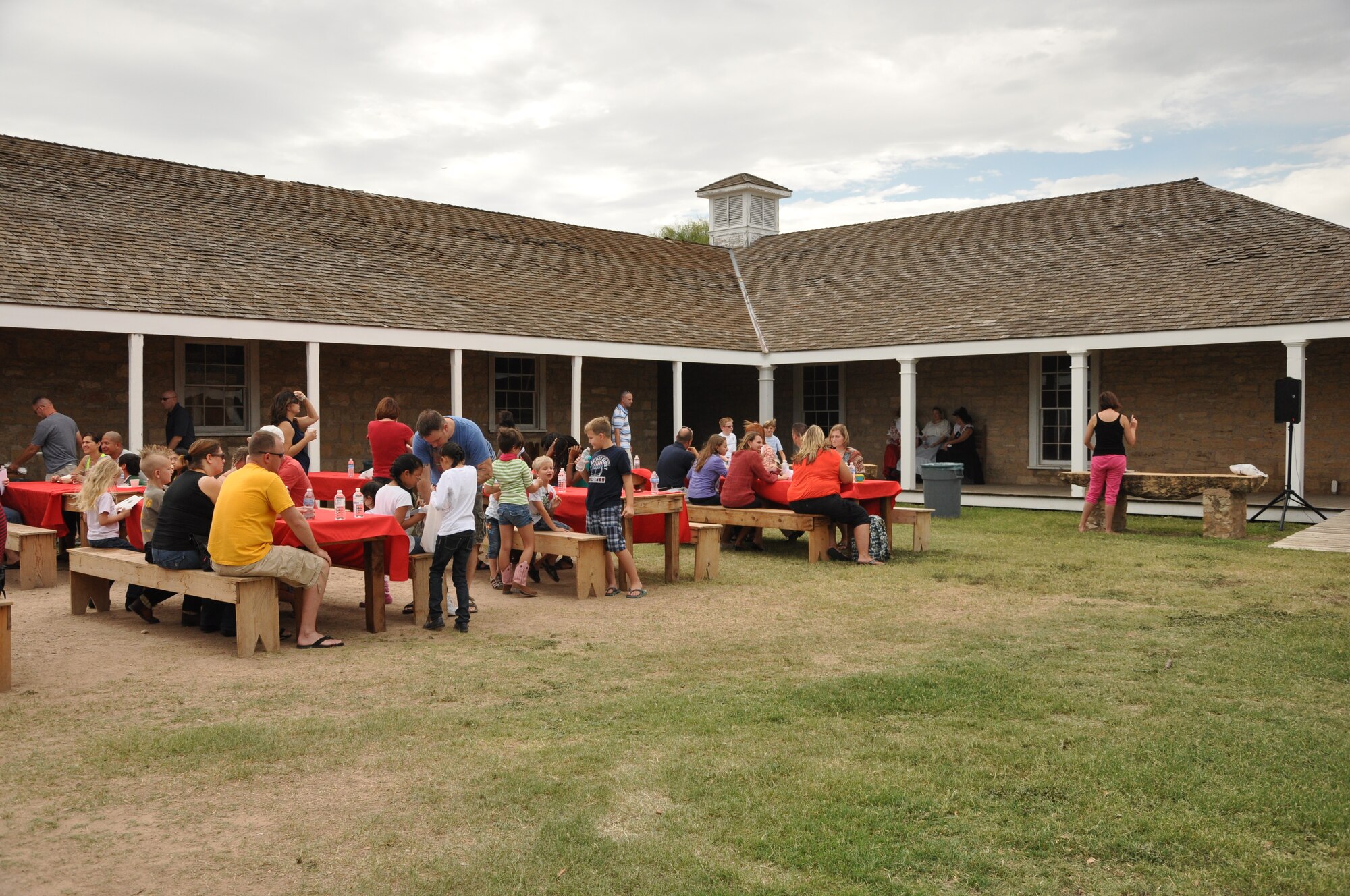 GOODFELLOW AIR FORCE BASE, Texas--Military families eat at the “Chuck Wagon” breakfast Aug. 25 at the Fort Concho National Historic Landmark. The museum offered free admission to military personal and their families to enjoy the free activities and food presented by Blue Star Museums. (U.S. Air Force photo/ Airman 1st Class Erica Flores)