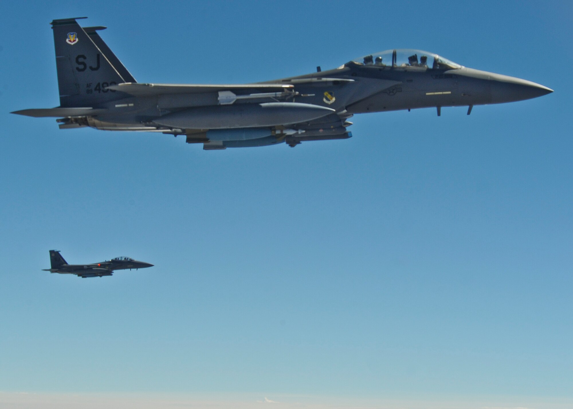 F-15s from the 4th Fighter Wing at Seymour Johnson Air Force Base, N.C. fly together during a Combat Hammer mission at Hill Air Force Base, Utah. The Combat Hammer missions were part of an annual month-long weapons system evaluation program held at the base by the 53rd Weapons Evaluation Group. The group is responsible for air-to-ground and air-to-air weapons evaluation for the Air Force.  The air-to-ground unit, known as Combat Hammer, is managed by the 86th Fighter Weapons Squadron, located at Eglin.  The air-to-air unit, known as Combat Archer, is managed by the 83rd Fighter Weapons Squadron, located at Tyndall AFB, Fla. (Courtesy photo)