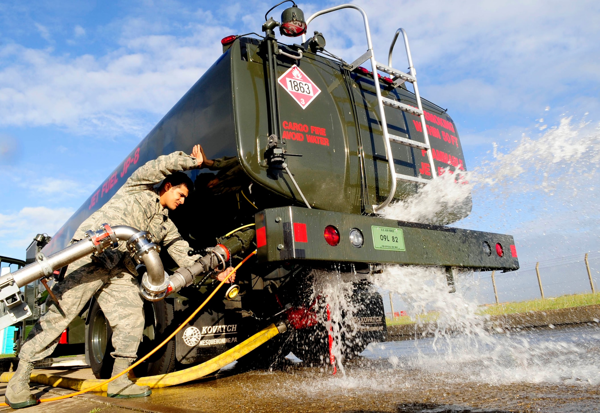 RAF MILDENHALL, England – Senior Airman Andrew Leal, 100th Logistics Readiness Squadron fuels technician, shuts off the fuel valve of a fuel truck during a major accident response exercise Aug. 30, 2012, at RAF Mildenhall. The MARE simulated a fuel spill due to a cracked flange connection during a fuel transfer. (U.S. Air Force photo/Senior Airman Ethan Morgan)