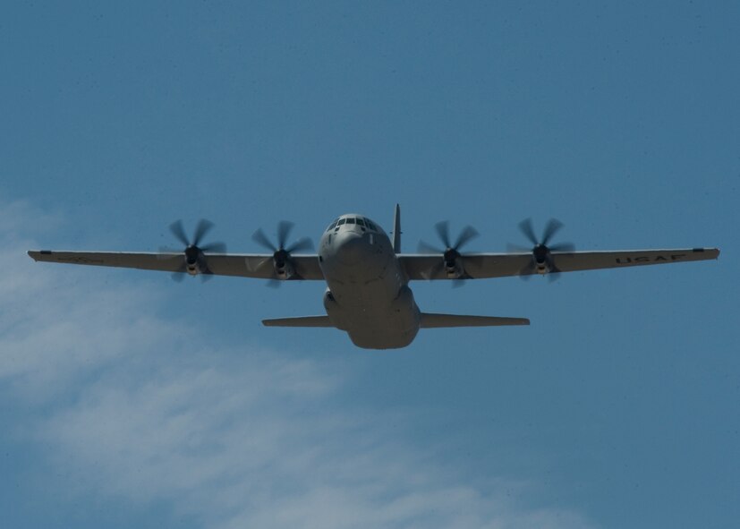 The newest U.S. C-130J Super Hercules flies over the flight line Aug. 29, 2012, at Dyess Air Force Base, Texas. The aircraft, delivered personally by U.S. Air Force Gen. William Fraser III, U.S. Transportation Command commander, is the 22nd of 28 to be delivered to Dyess by 2013, replacing the current legacy fleet of C-130 H-models. (U.S. Air Force photo by Airmen 1st Class Peter Thompson/ Released)