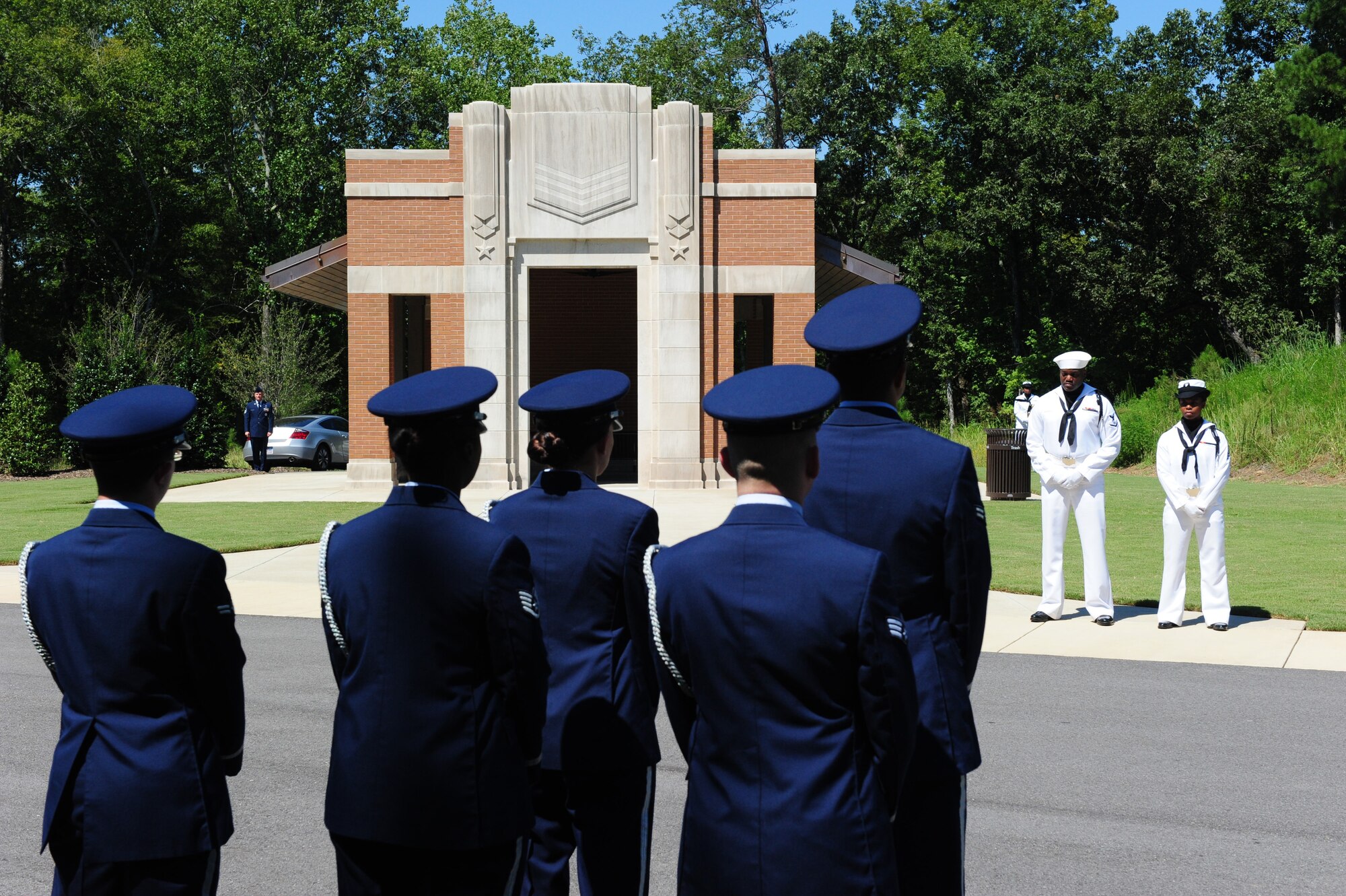 Members of the Maxwell Air Force Base Honor Guard perform a memorial ceremony held Aug. 22, 2012 at the Alabama National Cemetary in Montevallo Ala. Although Mr. was U.S. Naval veteran, Honor Guard Airmen participate in joint service funerals around the globe. (U.S. Air Force photo by Master Sgt. Michael Voss) 