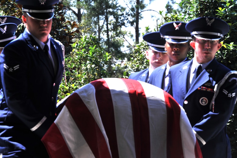 Airmen from Maxwell Air Force Base Honor Guard carry a casket during a funeral at Alabama National Cemetery, August 22. Maxwell' base honor guard supports requests throughout Alabama and parts of Georgia. (U.S. Air Force photo by Airman 1st Class William Blankenship)