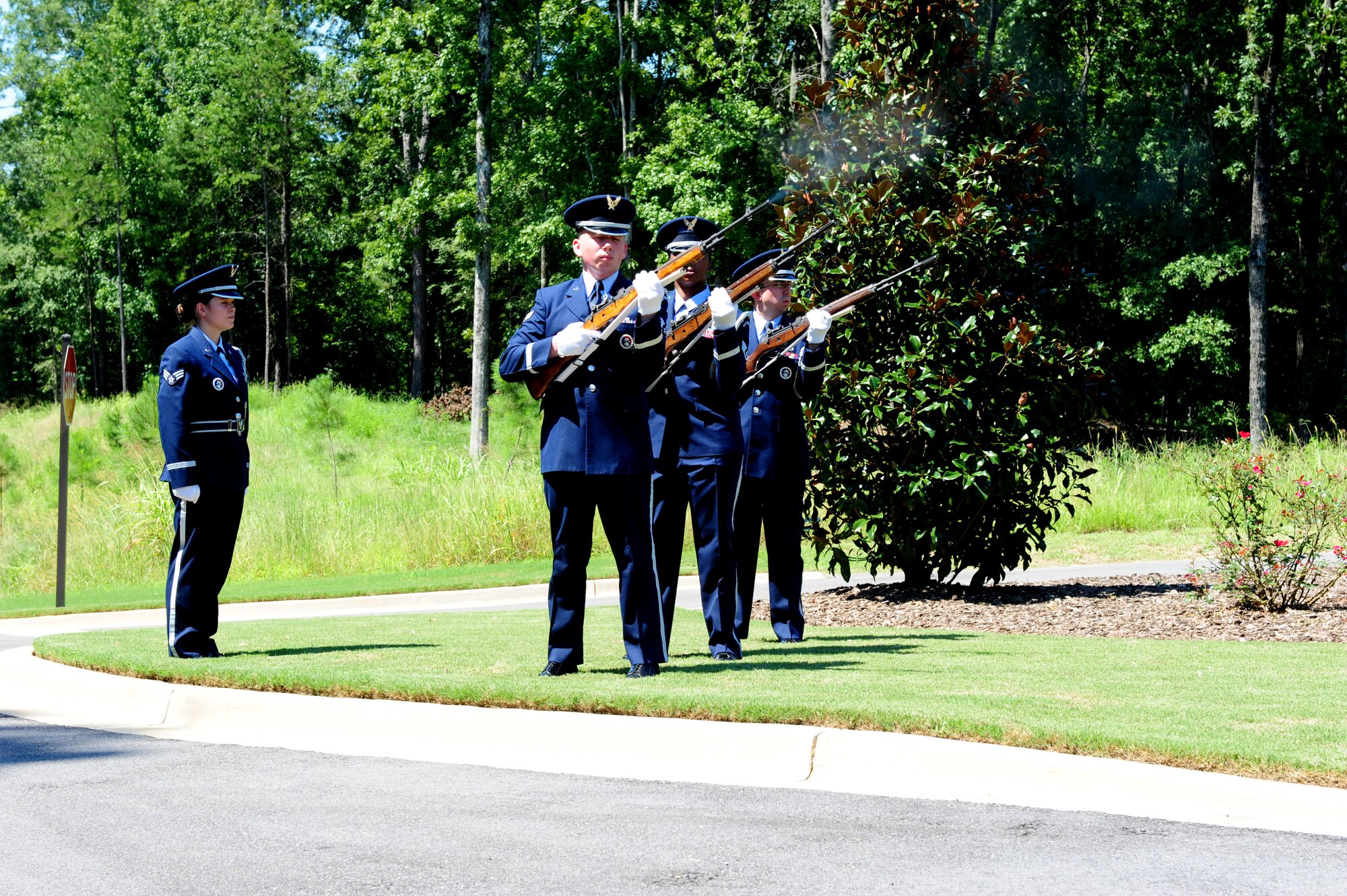 Members of the Maxwell Air Force Base Honor Guard perform a memorial ceremony held Aug. 22, 2012 at the Alabama National Cemetary in Montevello, Ala. (U.S. Air Force by Master Sgt. Michael Voss)