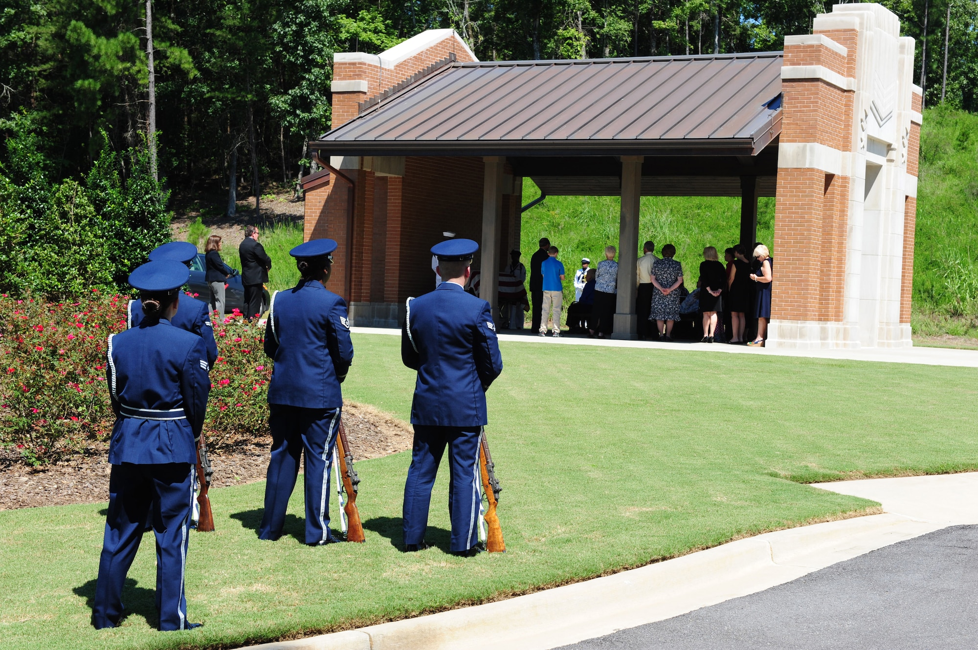 Members of the Maxwell Air Force Base Honor Guard perform a memorial ceremony held Aug. 22, 2012 at the Alabama National Cemetary in Montevello, Ala. (U.S. Air Force by Master Sgt. Michael Voss)