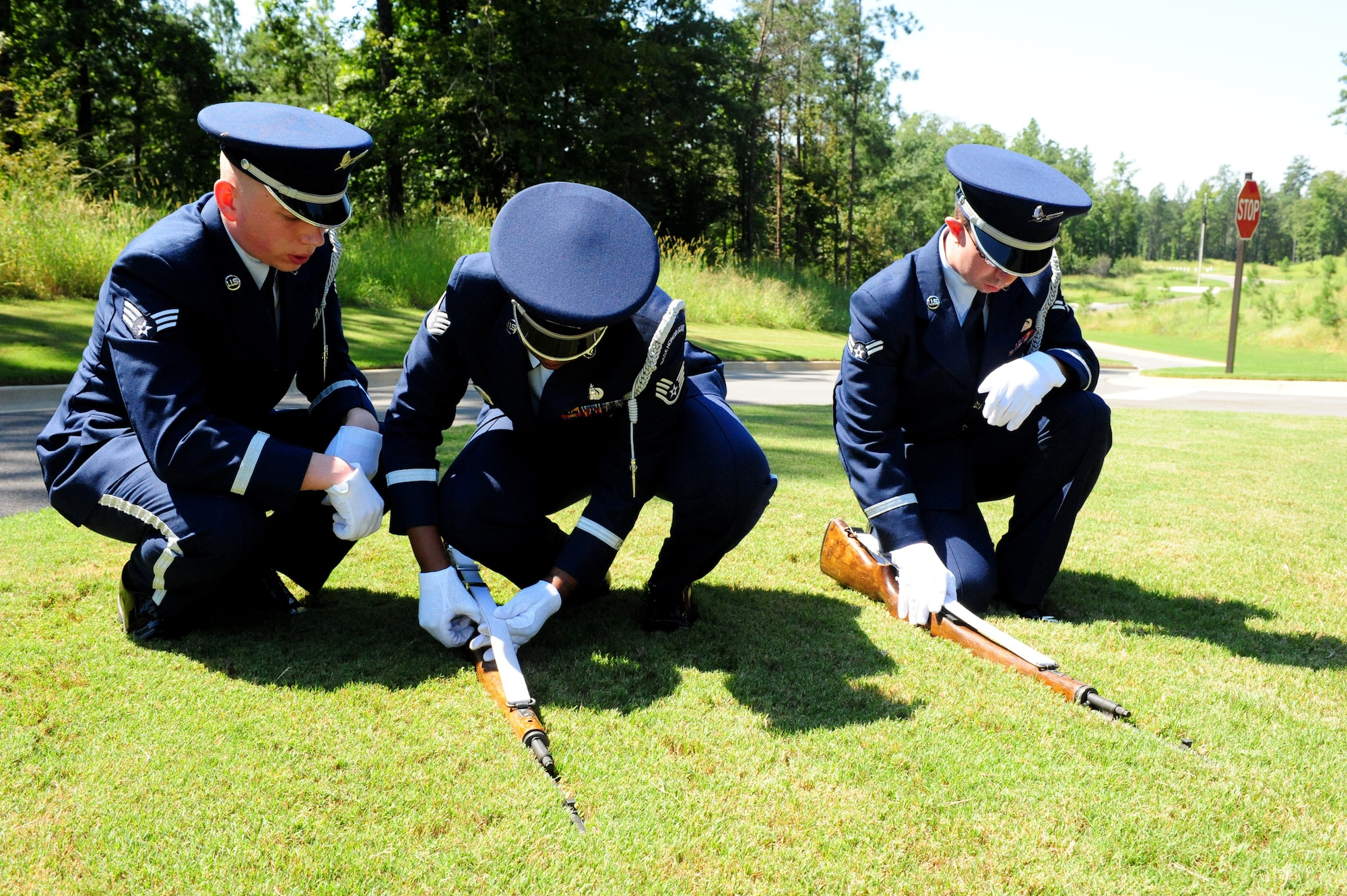 Members of the Maxwell Air Force Base Honor Guard perform a memorial ceremony held Aug. 22, 2012 at the Alabama National Cemetary in Montevallo Ala. Although Mr. was U.S. Naval veteran, Honor Guard Airmen participate in joint service funerals around the globe. (U.S. Air Force photo by Master Sgt. Michael Voss)