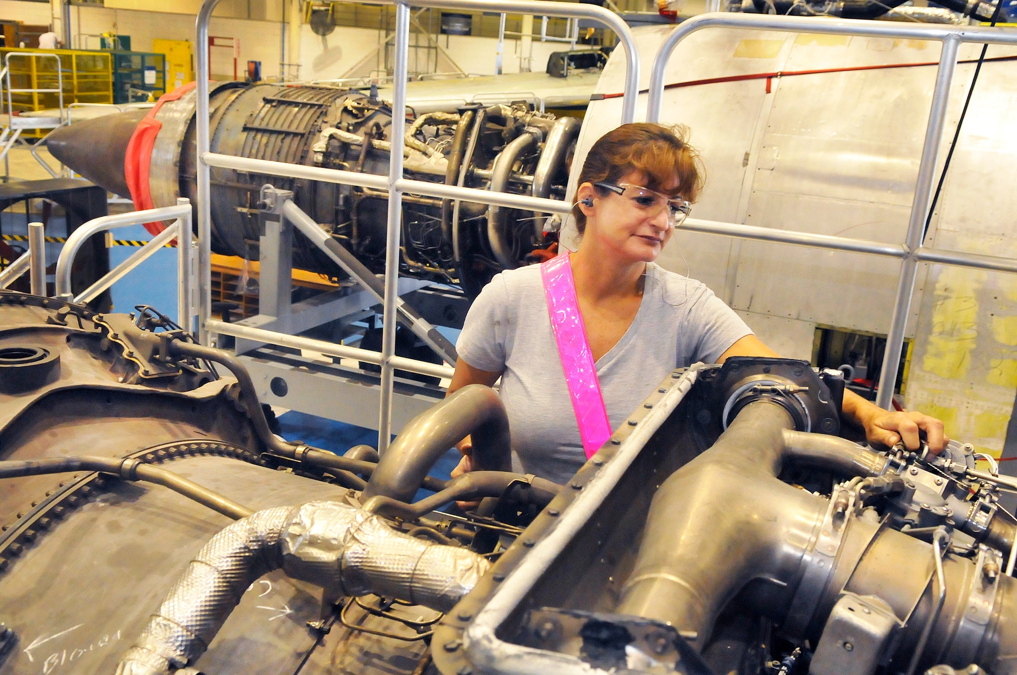Improvements in the C-5 engine shop have made the environment safer and has streamlined the process for mechanics like Jacqueline Ashby shown here. (U. S. Air Force photo/Sue Sapp)