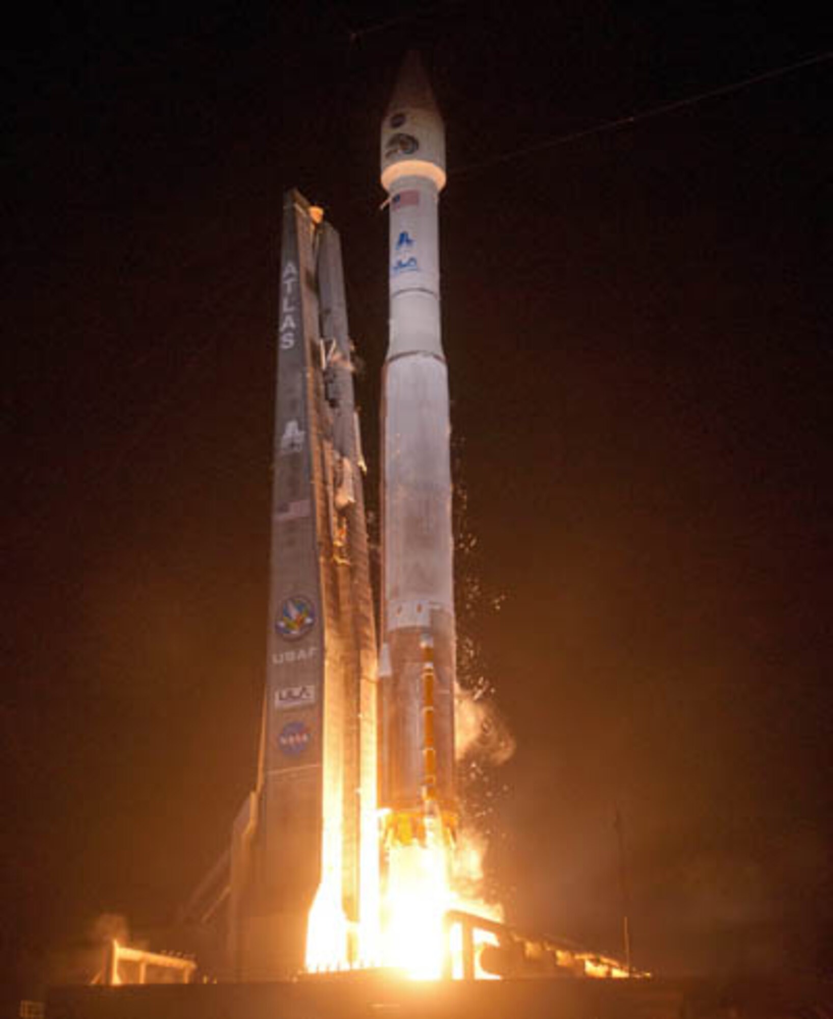After multiple scrubs, United Launch Alliance Atlas 5 rocket launches from Complex 41 in the early hours of Aug. 30. Atlas 5 is carrying two heavily shielded 1,400-pound satellites, Radiation Belt Storm Probes, that will fly in tandem through Earth's energetic Van Allen radiation belts in a two-year mission to probe the structure of the huge doughnut-shaped zones, how they are affected by titanic solar storms and the threat they pose to astronauts and costly spacecraft, according to CBS News "Space Place". (United Launch Alliance/Pat Corkery)