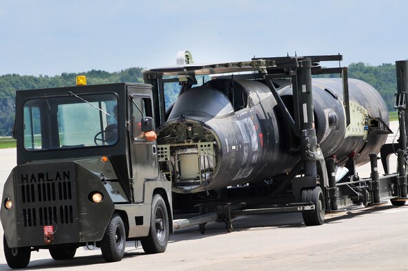 A broken U-2 arrived at Robins Friday, where local battle damage experts will see if it's possible to repair the plane and return it to the Air Force's reconnaissance aircraft fleet. (U. S. Air Force photo/Sue Sapp)