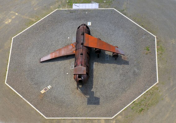 Westovers "Miss Piggy," an FAA certified training site for all airport firefighters, uses propane to simulate aircraft fires from a crash with fully involved fire to a single engine fire. The instructor can initiate about 15 different scenarios such as interior cargo fire, cockpit fire, wheel well fire, or a engine fire with running fuel dripping down. (U.S. Air Force photo by SrA. Kelly Galloway)