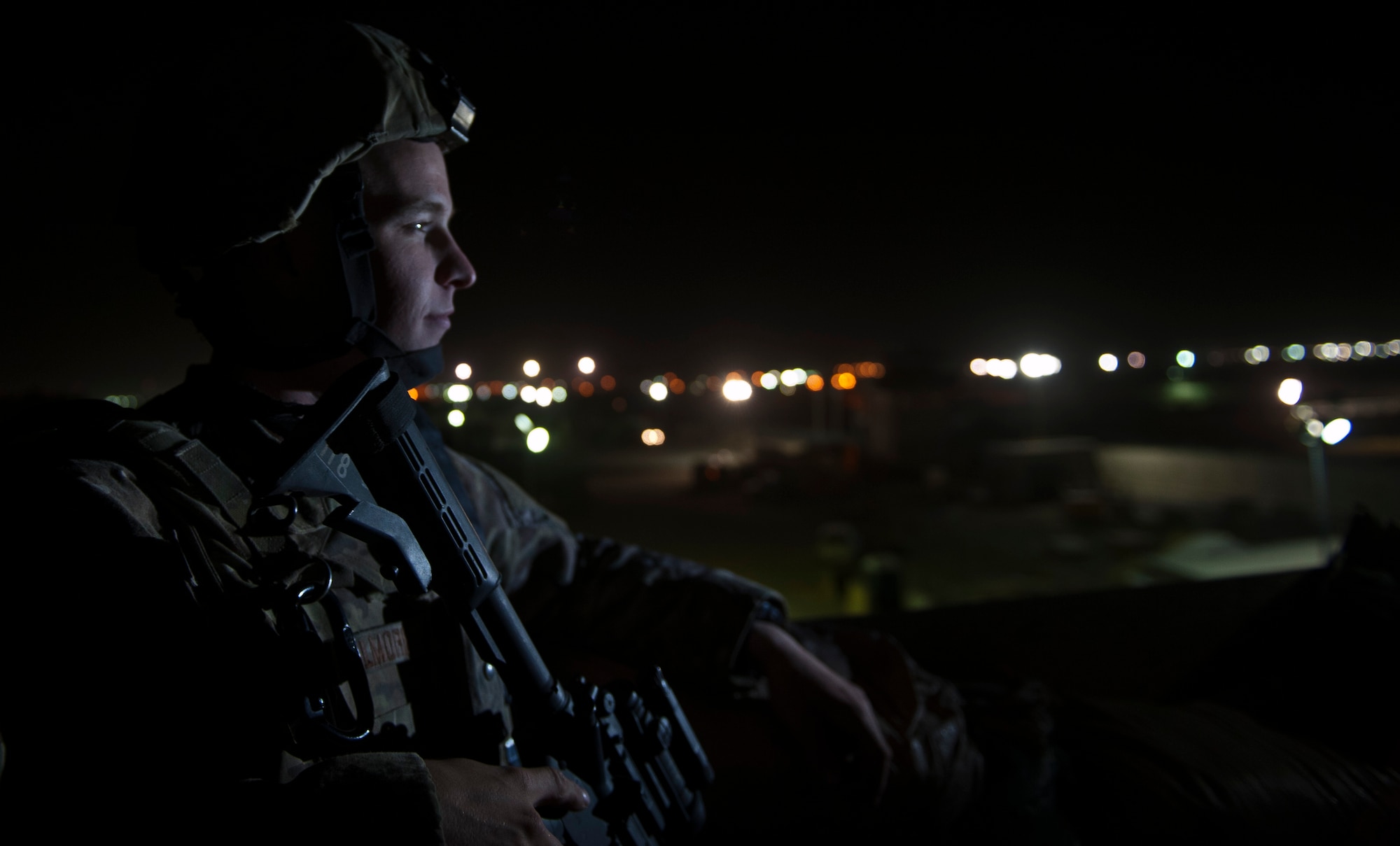 An Airman deployed with the 455th Expeditionary Security Forces Squadron monitors an entry control point at Bagram Airfield Afghanistan, Aug. 24, 2012. Bagram’s large size and vital mission make it a strategic target for insurgents seeking to demonstrate capability, which is why the Airmen from 455 ESFS remain ever-vigilant against the threat of enemy attacks. (U.S. Air Force Photo/Capt. Raymond Geoffroy)