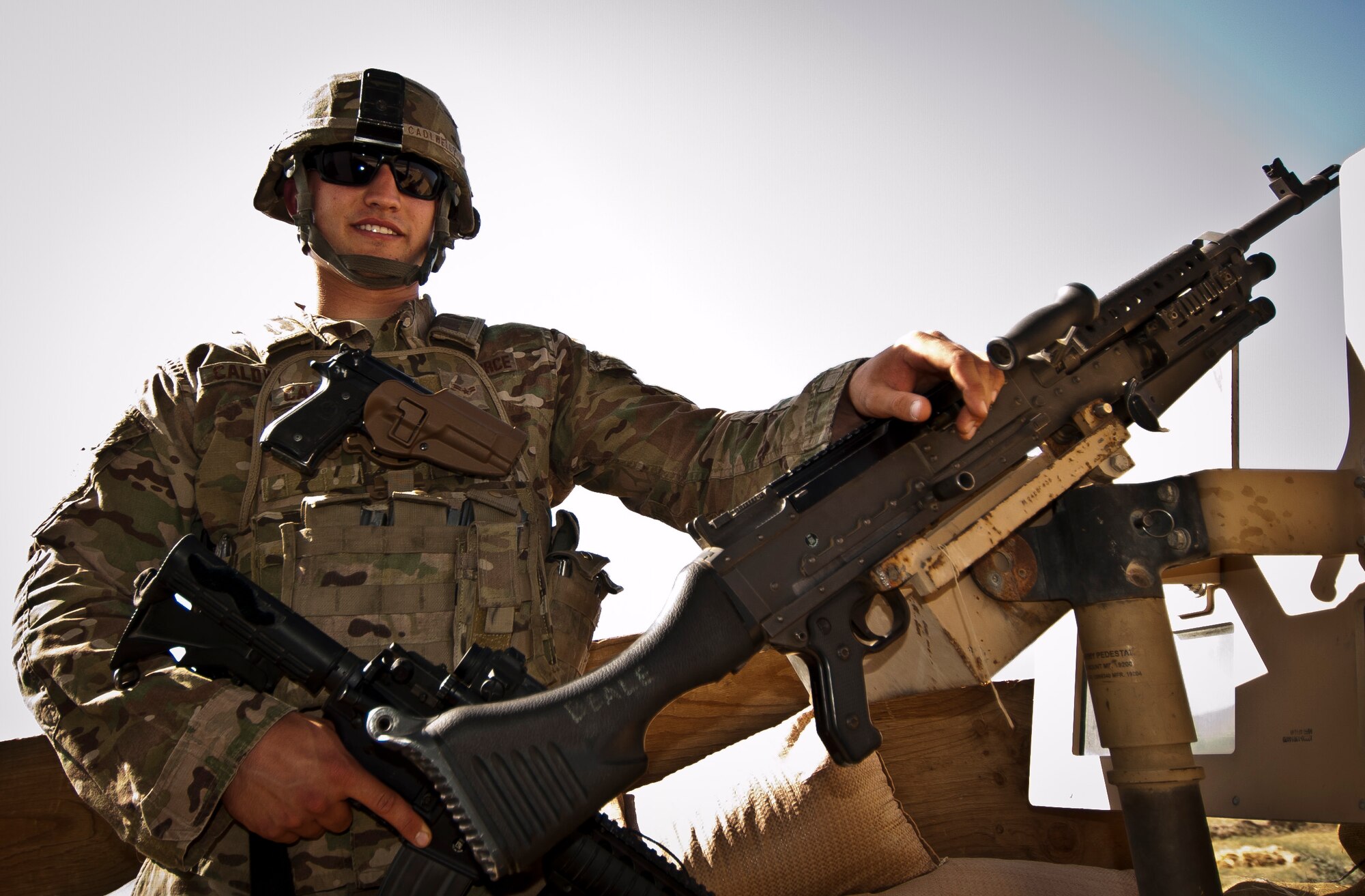 A1C Kory Caldwell, an Airman assigned to the 455th Expeditionary Security Forces Squadron keeps watch at a guard tower at Bagram Airfield Afghanistan, Aug. 18, 2012. Bagram’s large size and vital mission make it a strategic target for insurgents seeking to demonstrate capability, which is why the Airmen from 455 ESFS remain ever-vigilant against the threat of enemy attacks. (U.S. Air Force Photo/Capt. Raymond Geoffroy)