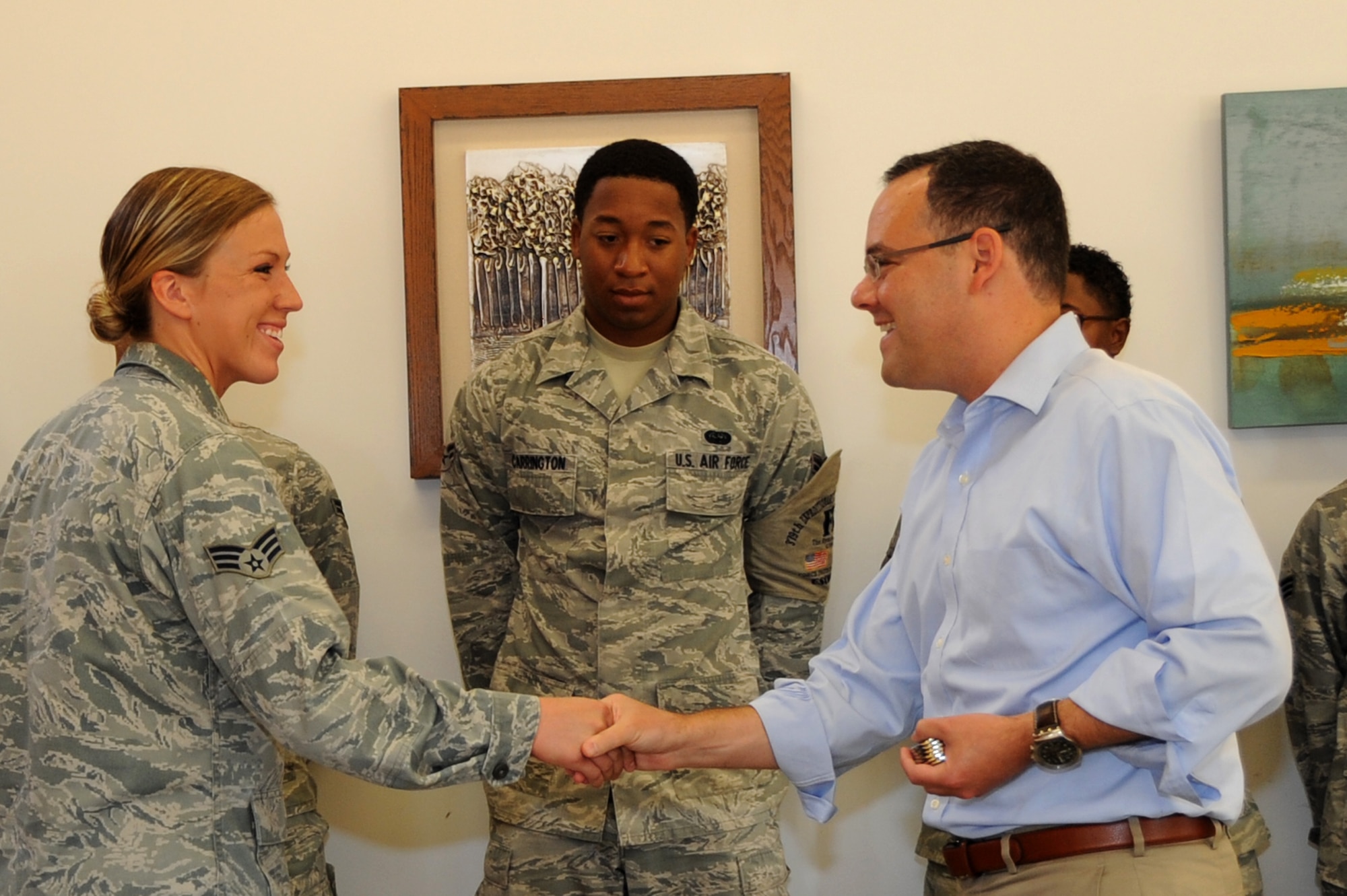 Mr. Daniel Ginsberg, Assistant Secretary of the Air Force for Manpower and Reserve Affairs, meets with airmen following breakfast during his visit at the 379th AEW, Southwest Asia, August 29, 2012. Mr.Ginsberg is responsible for providing overall supervision of manpower, military and civilian personnel, Reserve component affairs, and readiness support for the Department of the Air Force. (U.S. Air Force photo/Staff Sgt. Sheila deVera)

