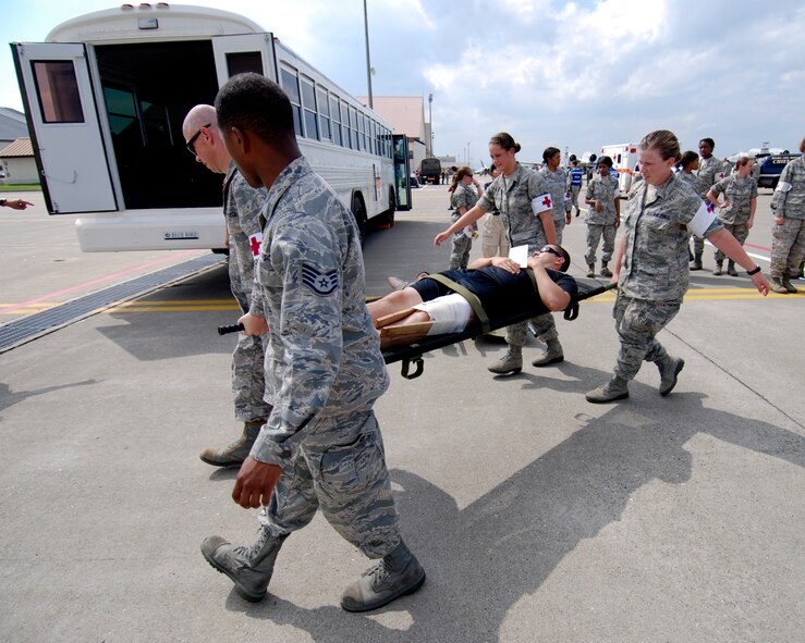 U.S. Air Force emergency responders from the 35th Medical Group evacuate a simulated casualty during a major accident response exercise (MARE) at Misawa Air Base, Japan, Aug. 30, 2012. Misawa Air Base conducts this exercise annually to demonstrate the effectiveness of the base personnel's ability to handle a mass casualty situation. (U.S. Navy photo/Mass Communication Specialist 2nd Class Kenneth G. Takada/Released) 

