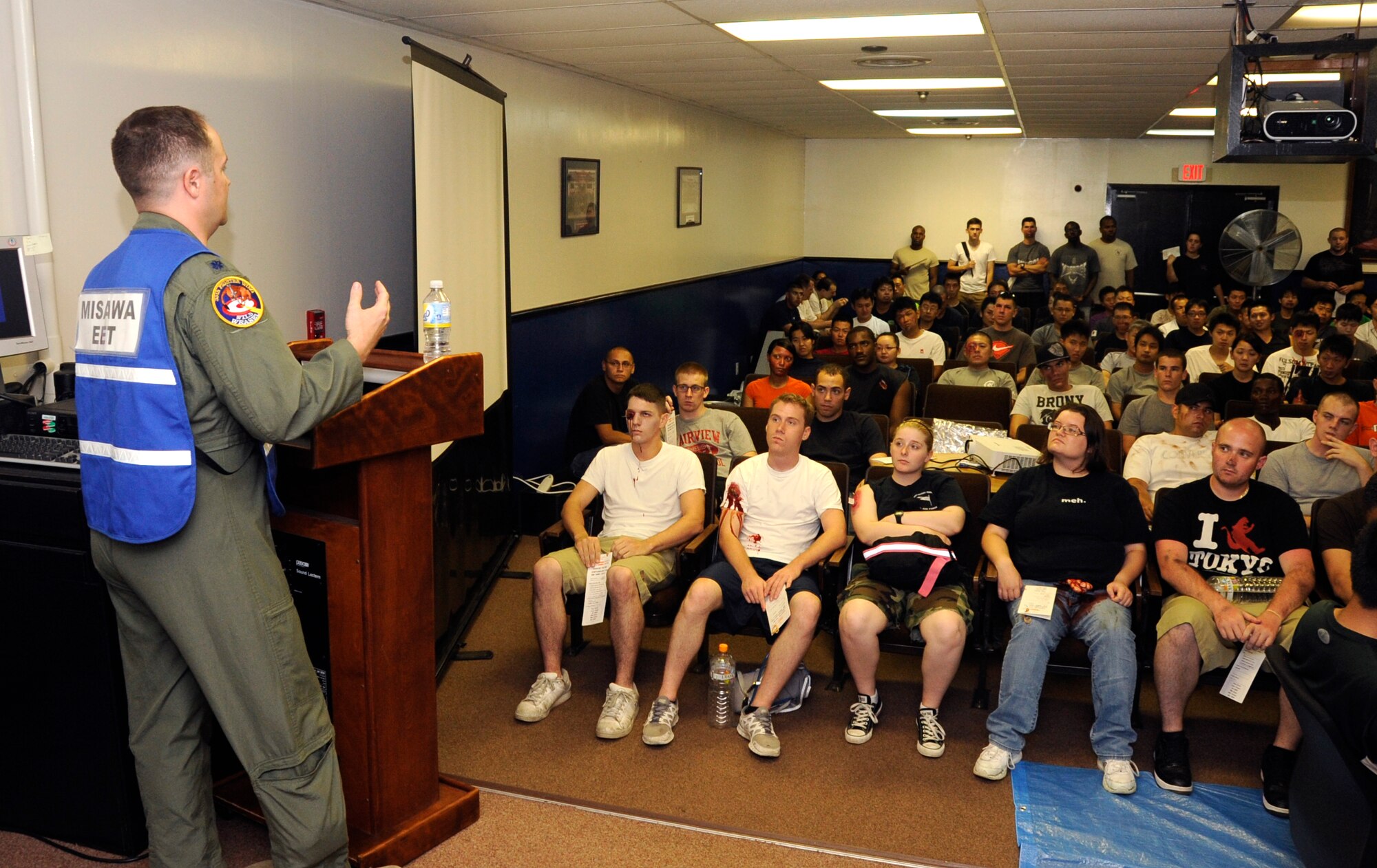 U.S. Air Force Lt. Col. Thomas Dent, 35th Fighter Wing inspector general, speaks to volunteer role-players about safety in preparation for the Major Accident Response Exercise at Misawa Air Base, Japan, Aug. 30, 2012. Role-players were used in the MARE to create a more realistic scenario and help prepare emergency responders for a real life crisis. (U.S. Air Force photo by Airman 1st Class Kaleb Snay/Released)