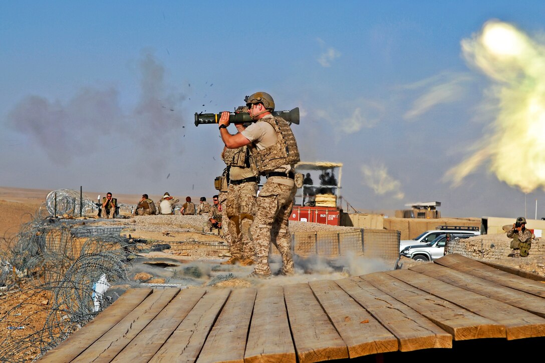 A special operations forces soldier fires an AT-4 shoulder-fired rocket launcher at the heavy weapons firing range on a base in the Tarin Kowt district in Afghanistan's Uruzgan province, Aug. 22, 2012. The soldier is assigned to Special Operations Task Force Southeast.