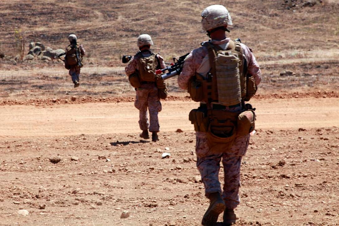Marines with 3rd Squad, 1st Platoon, Kilo Company, Battalion Landing Team 3/5, 15th Marine Expeditionary Unit, patrol back to a rally point after clearing a town, as part of the unitâ€™s final pre-deployment training, Certification Exercise, Aug. 27. Certification Exercise was different than the previous exercises the MEU conducted as part of their pre-deployment training. During this training, the Marines and Sailors did not know what was on the training schedule and were expected to react to scenarios quickly using the Marine Corpsâ€™ Rapid Response Planning Process to prepare for the missions the unit will execute.